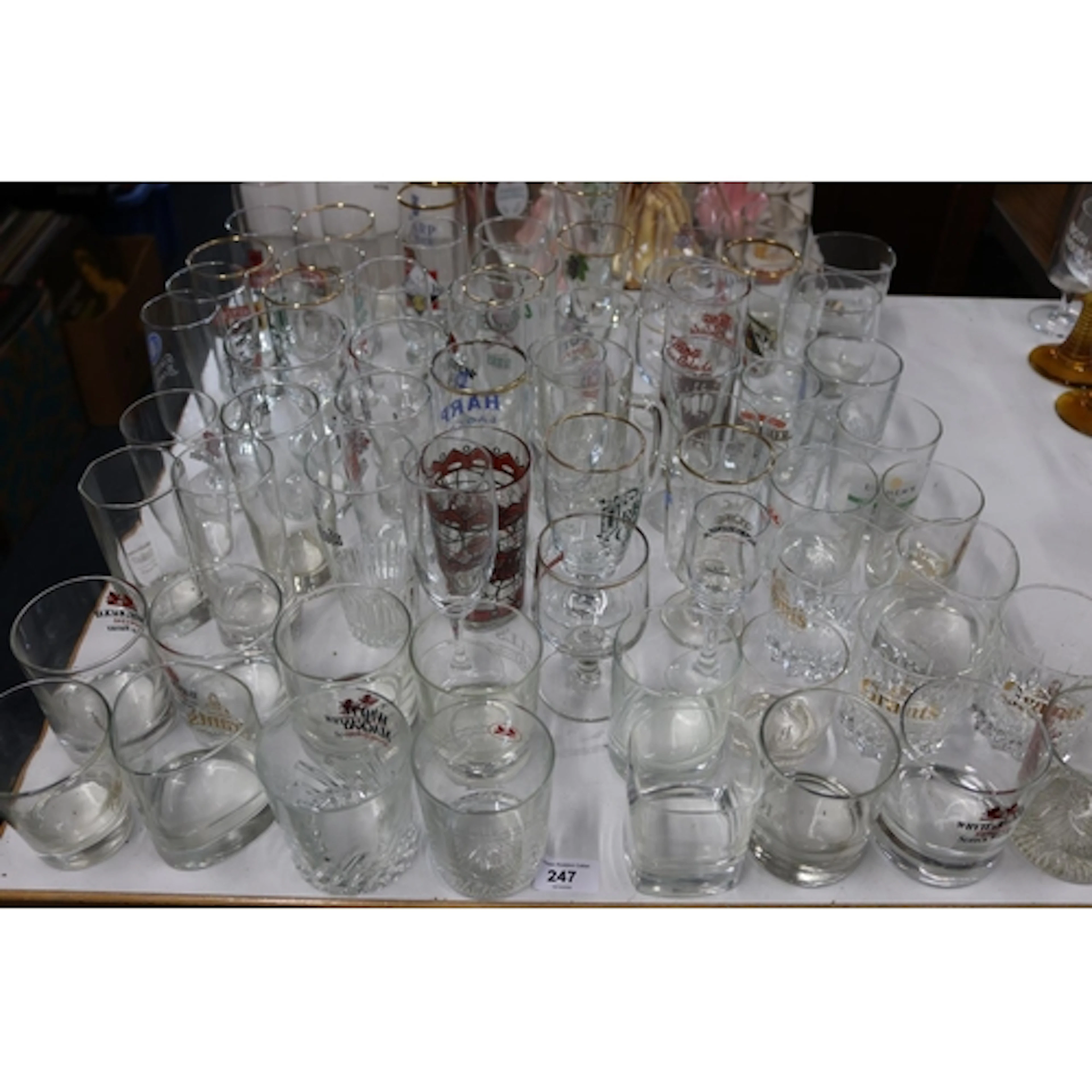 Branded glassware to include whisky tumblers, lager glasses ...