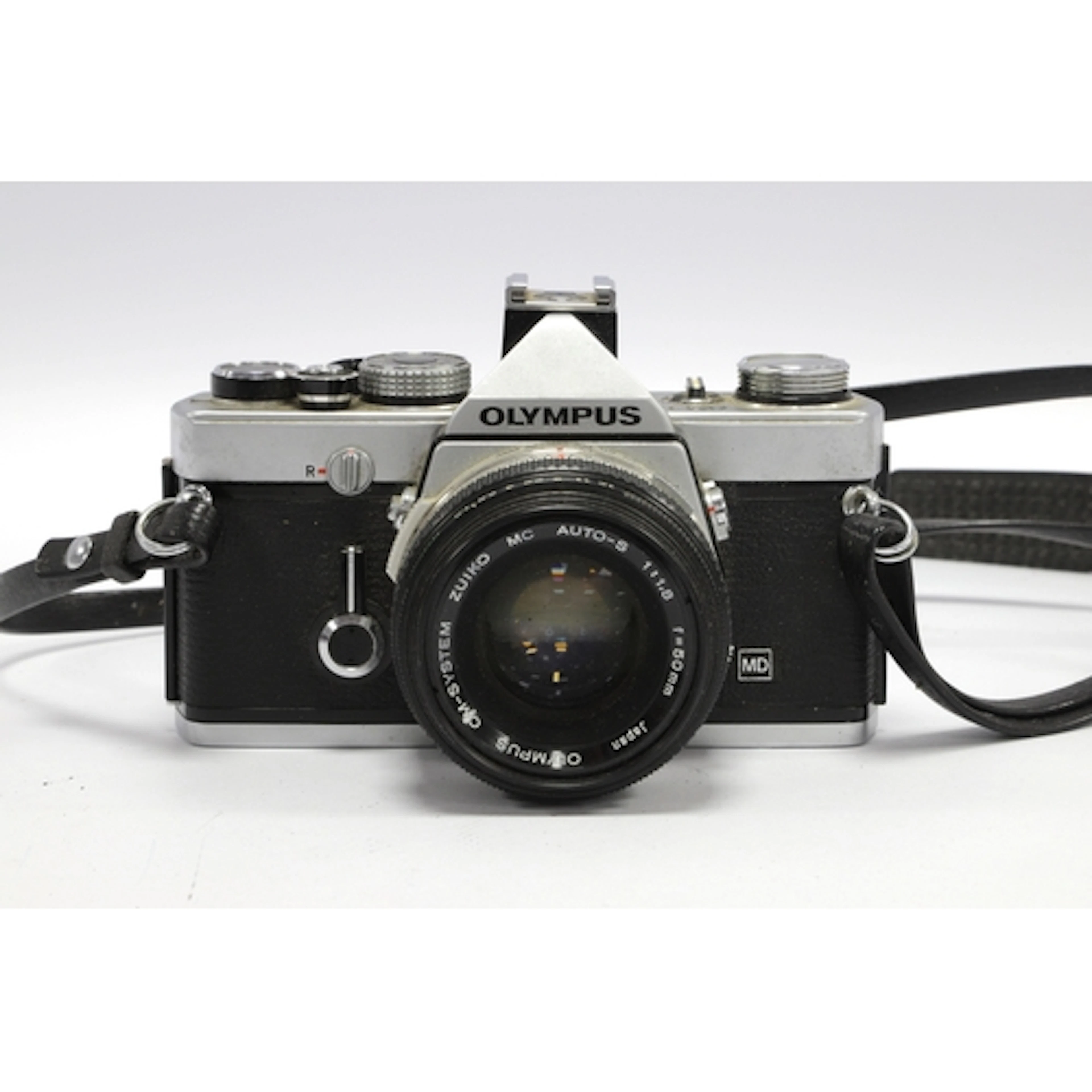Olympus OM-1N MD 35mm SLR Film Camera with attached Zuiko MC...