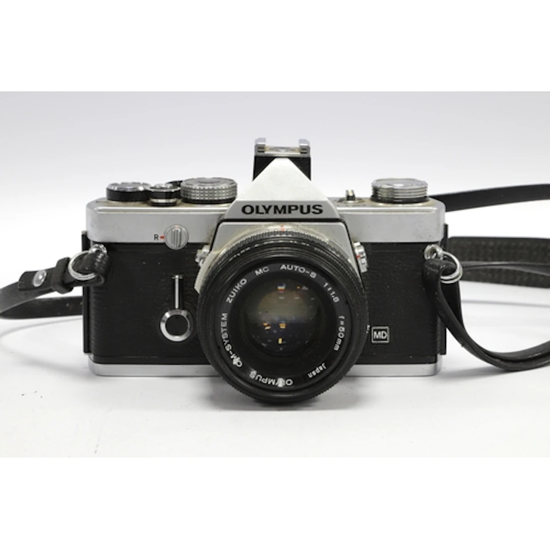 Olympus OM-1N MD 35mm SLR Film Camera with attached Zuiko MC...