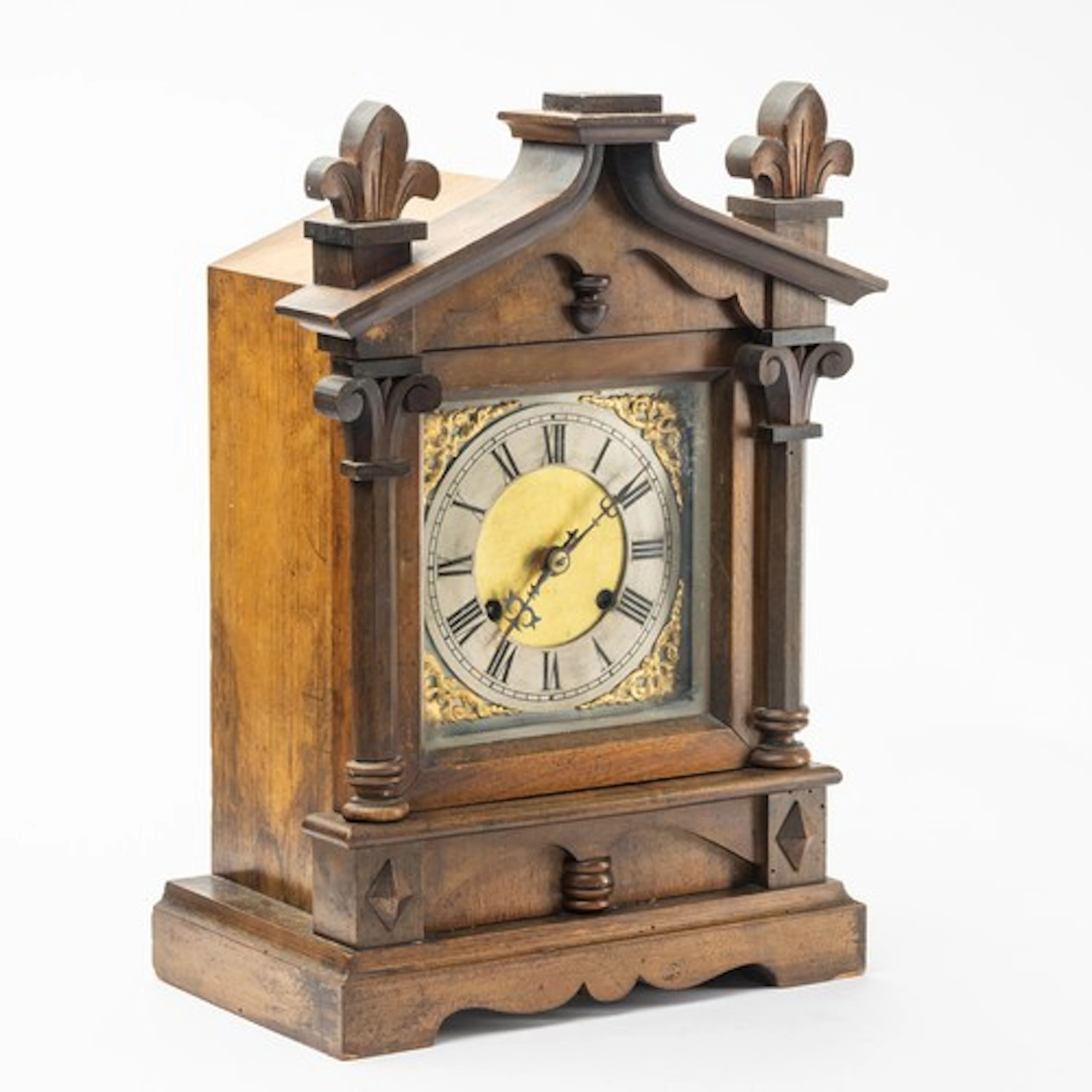 A Continental cabinet mantle clock, the mahogany case in the...
