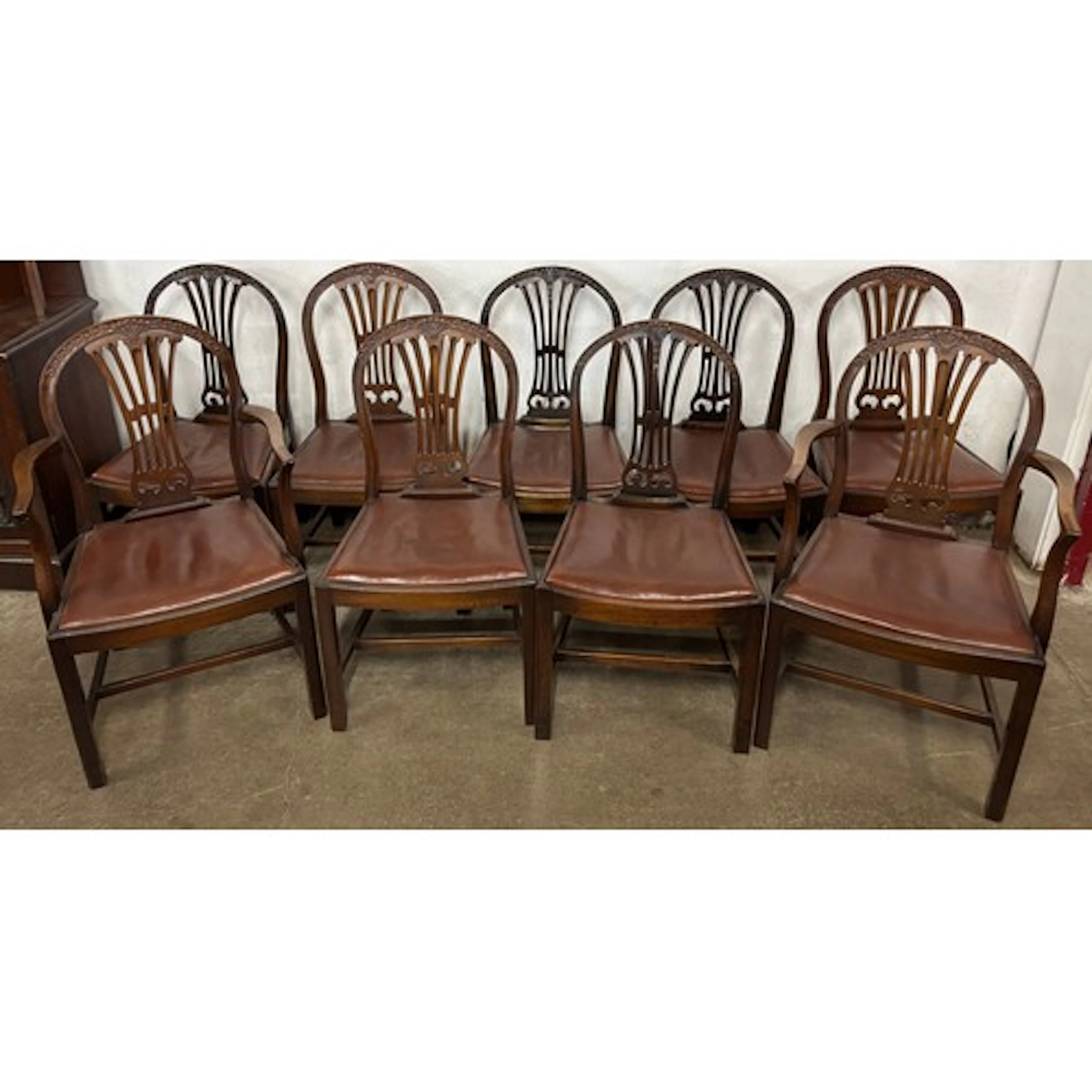 A set of nine Edward VII Hepplewhite Revival mahogany dining...