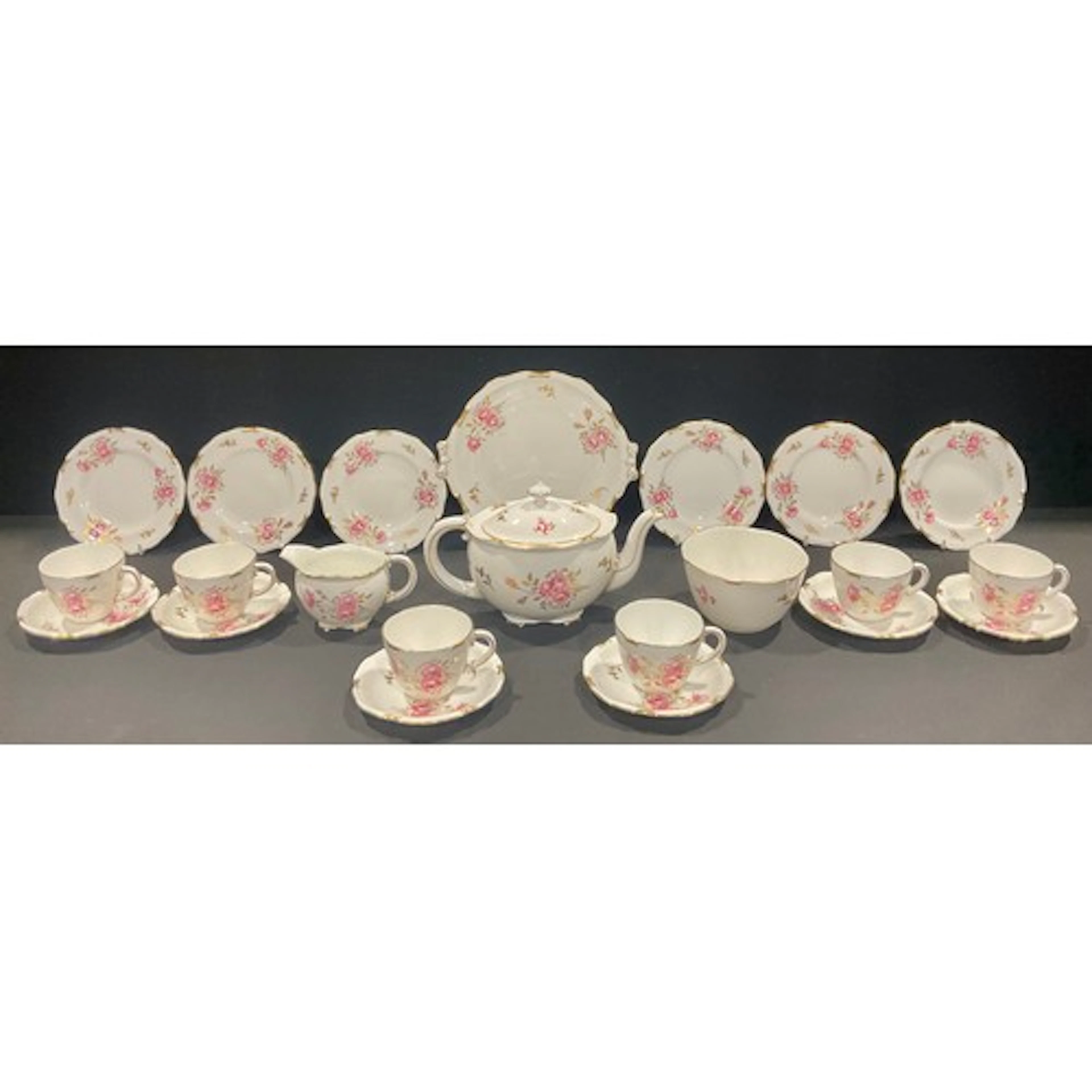 A Royal Crown Derby Pinxton Roses pattern tea service for si...