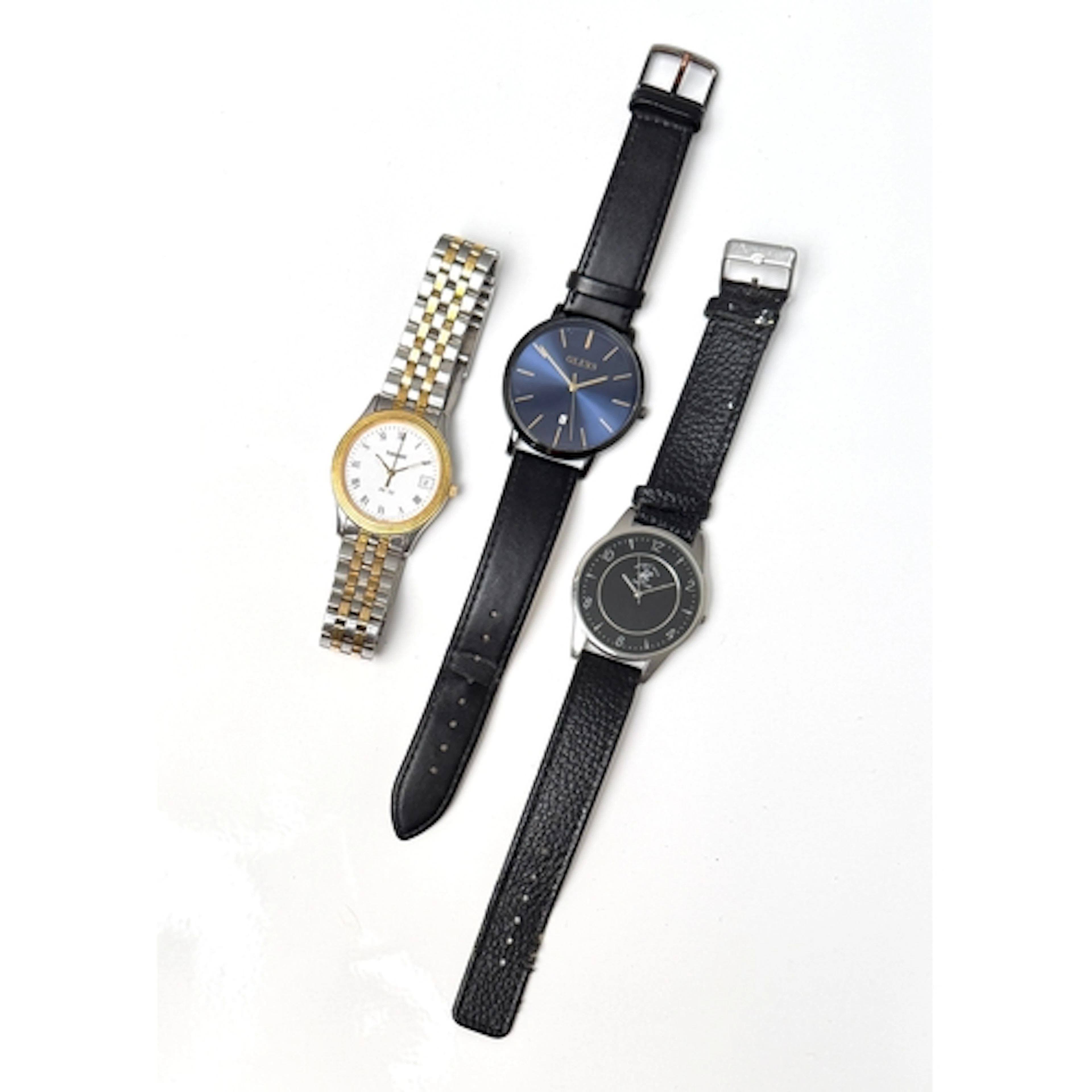 Three gents quartz wrist watches - comprising a Tissot PR 50...