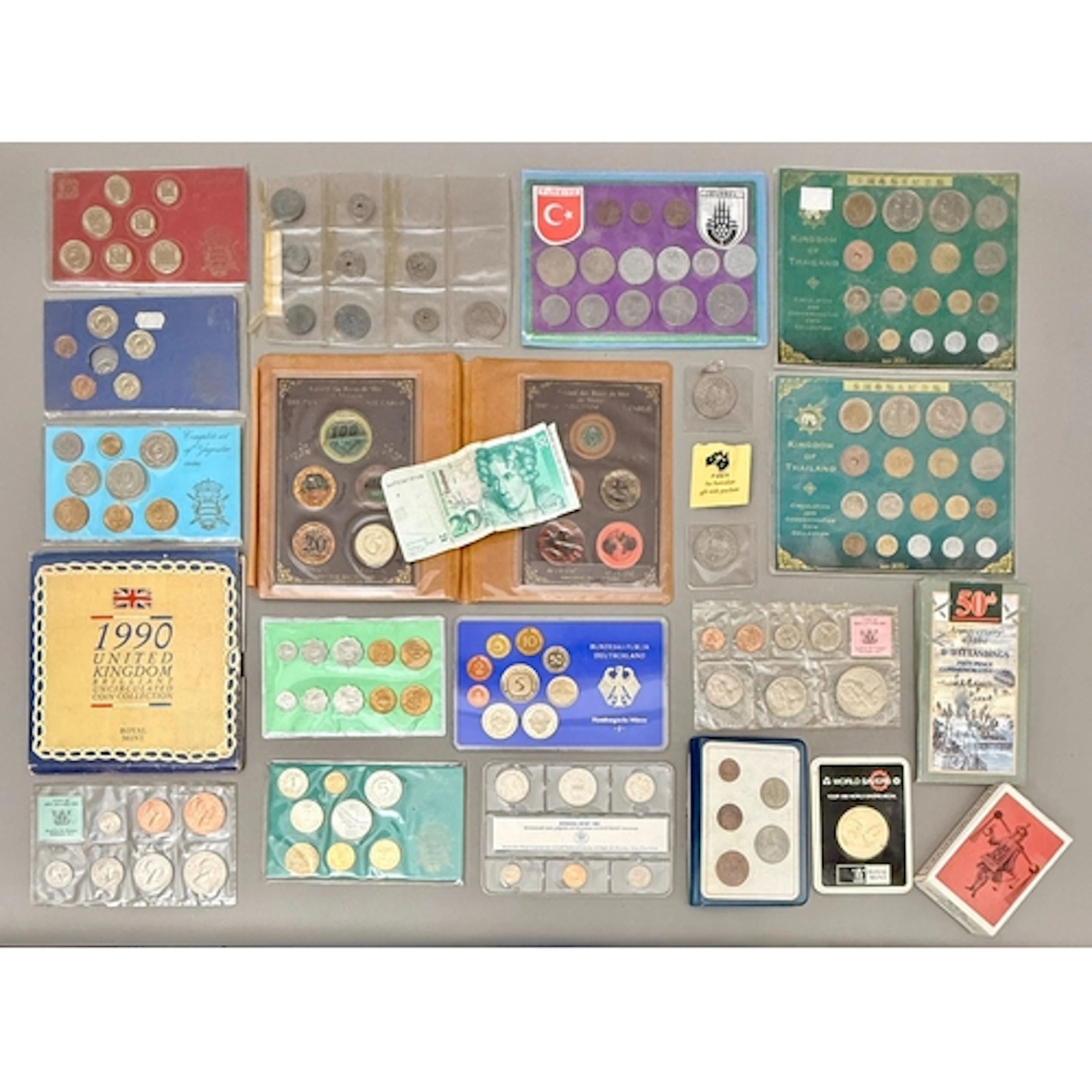 A small collection of world proof coin sets - 1960s-80s, inc...