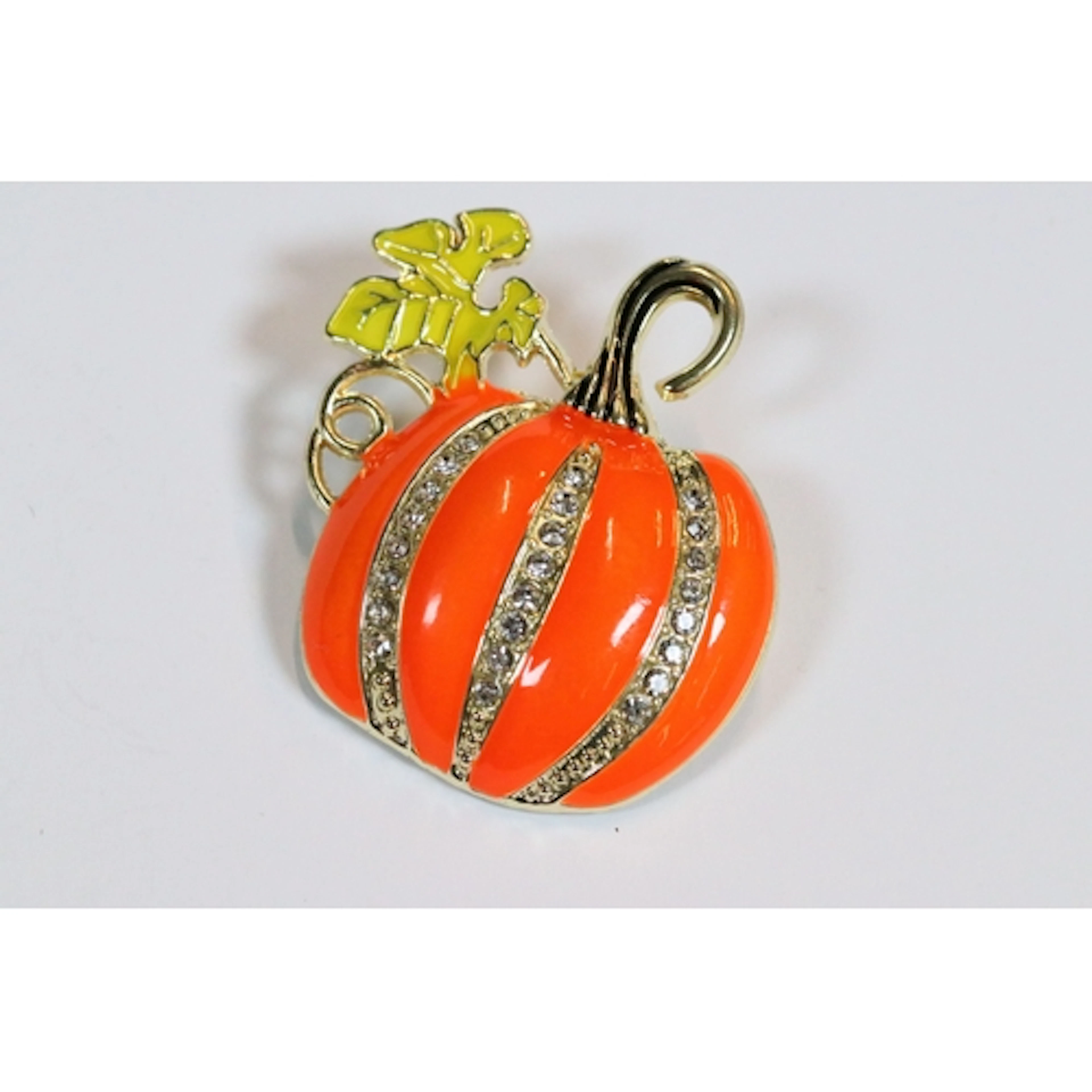 A contemporary gold tone Halloween brooch in the form Pumpki...