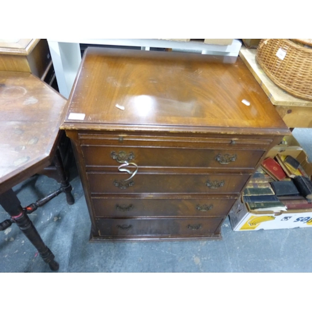 Mahogany chest of four drawers with brushing slide. 63cm wid...