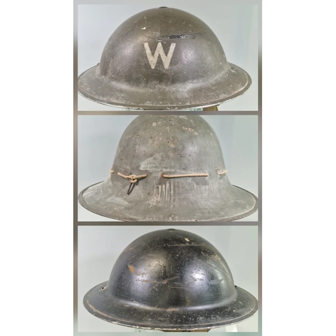 Three helmets, comprising a British Mk II Brodie warden’s he...