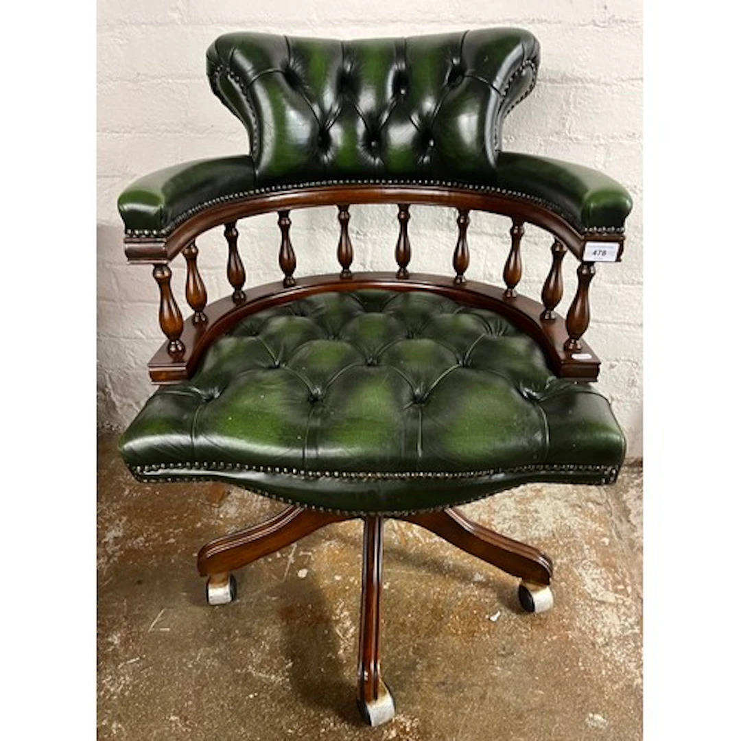 Reproduction button-back swivel office chair.