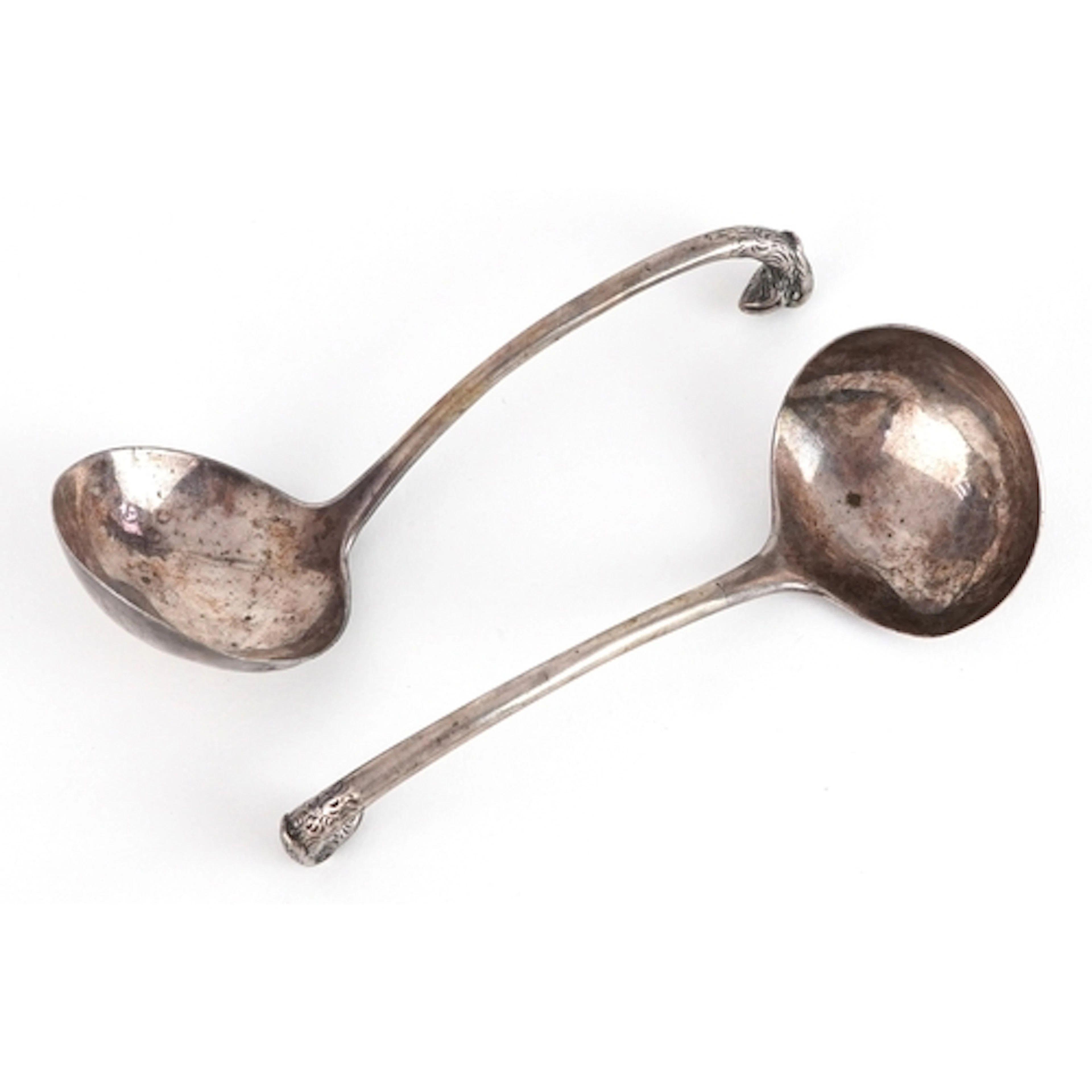 Pair of antique silver ladles with bird head handles, indist...