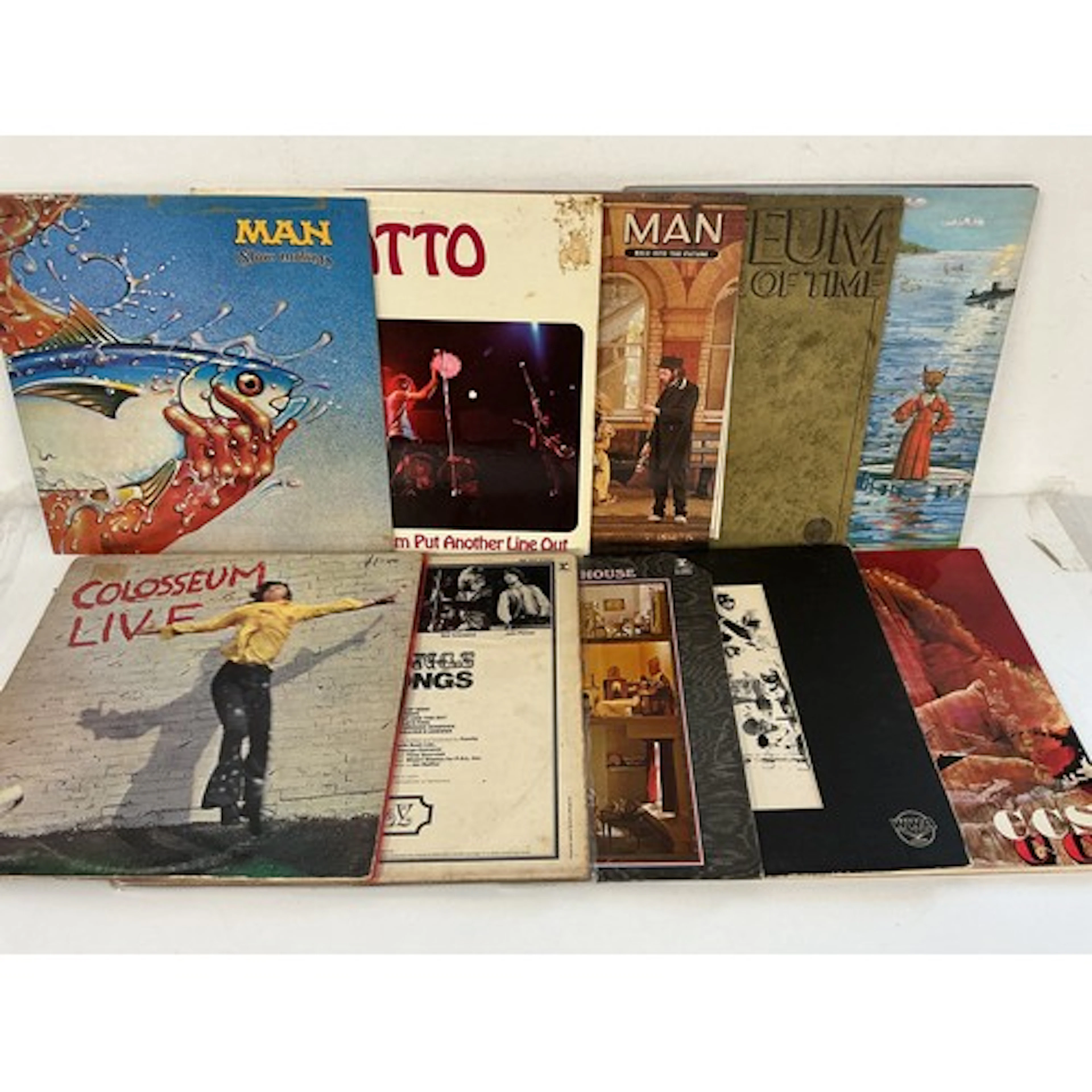 Two bags containing 20 rock and prog rock LPs by various art...