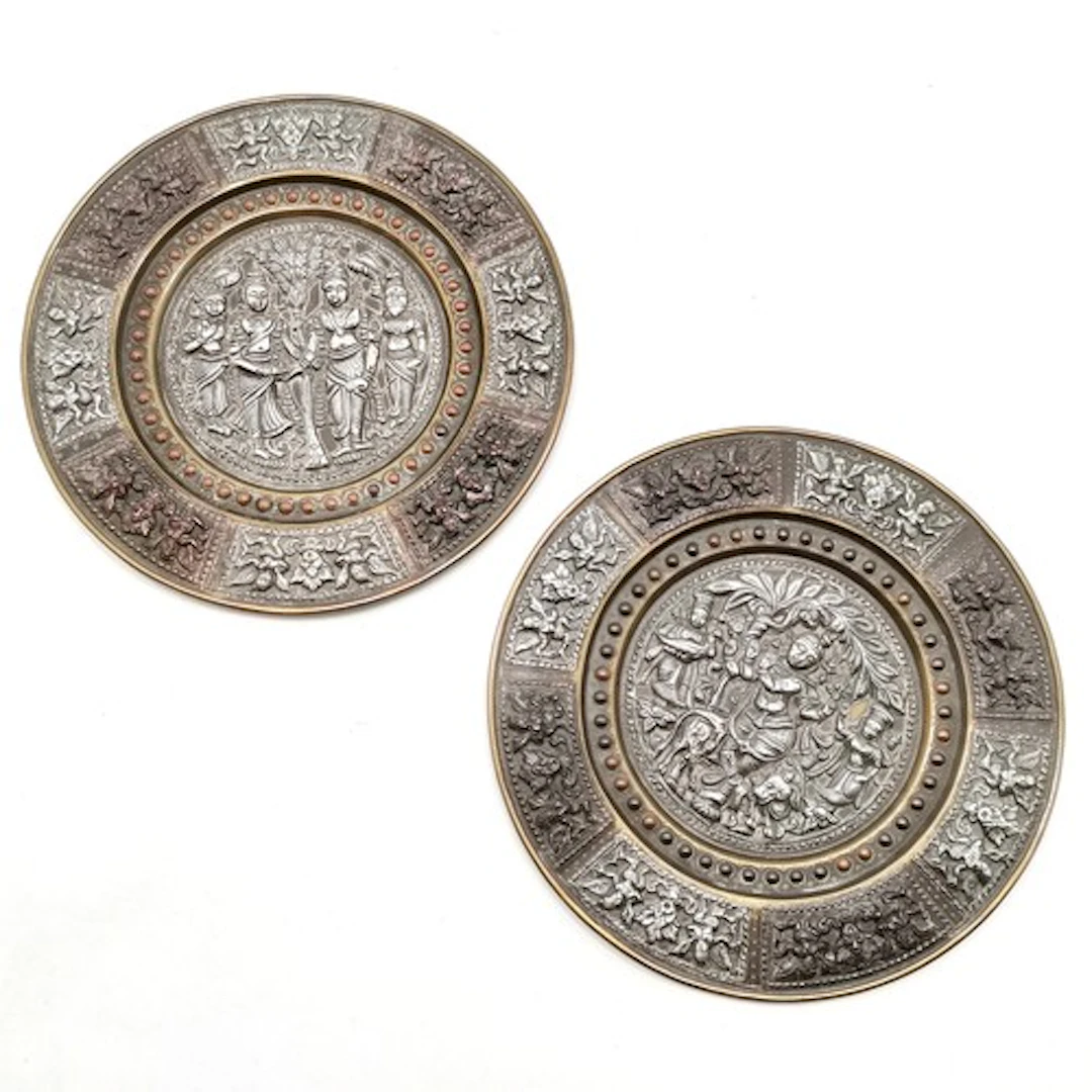 2 x antique Indian silver decorated embossed circular plaque...