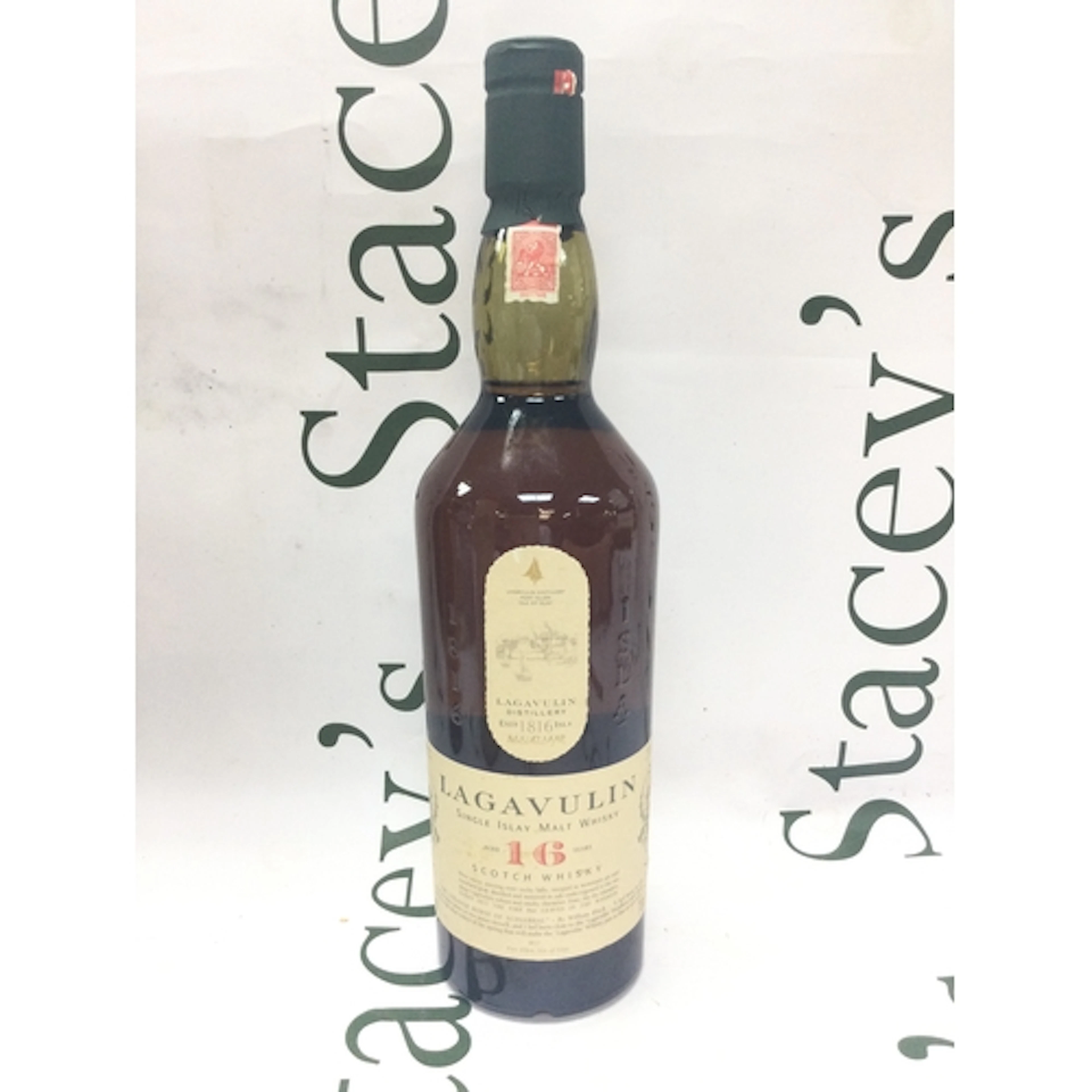 A bottle of lagavulin single islay malt whisky aged 16 years