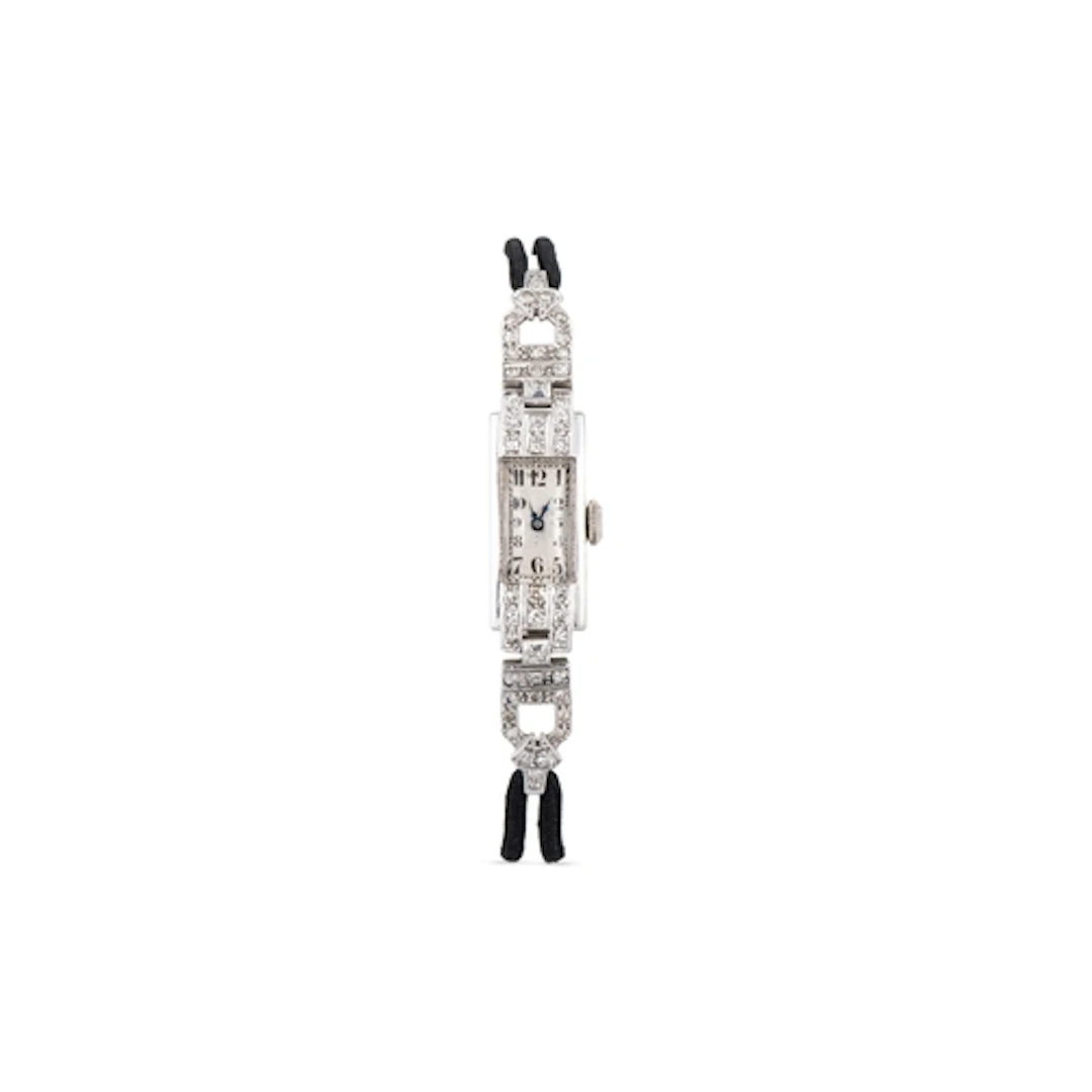 AN ART DECO DIAMOND COCKTAIL WATCH, platinum case, cord stra...