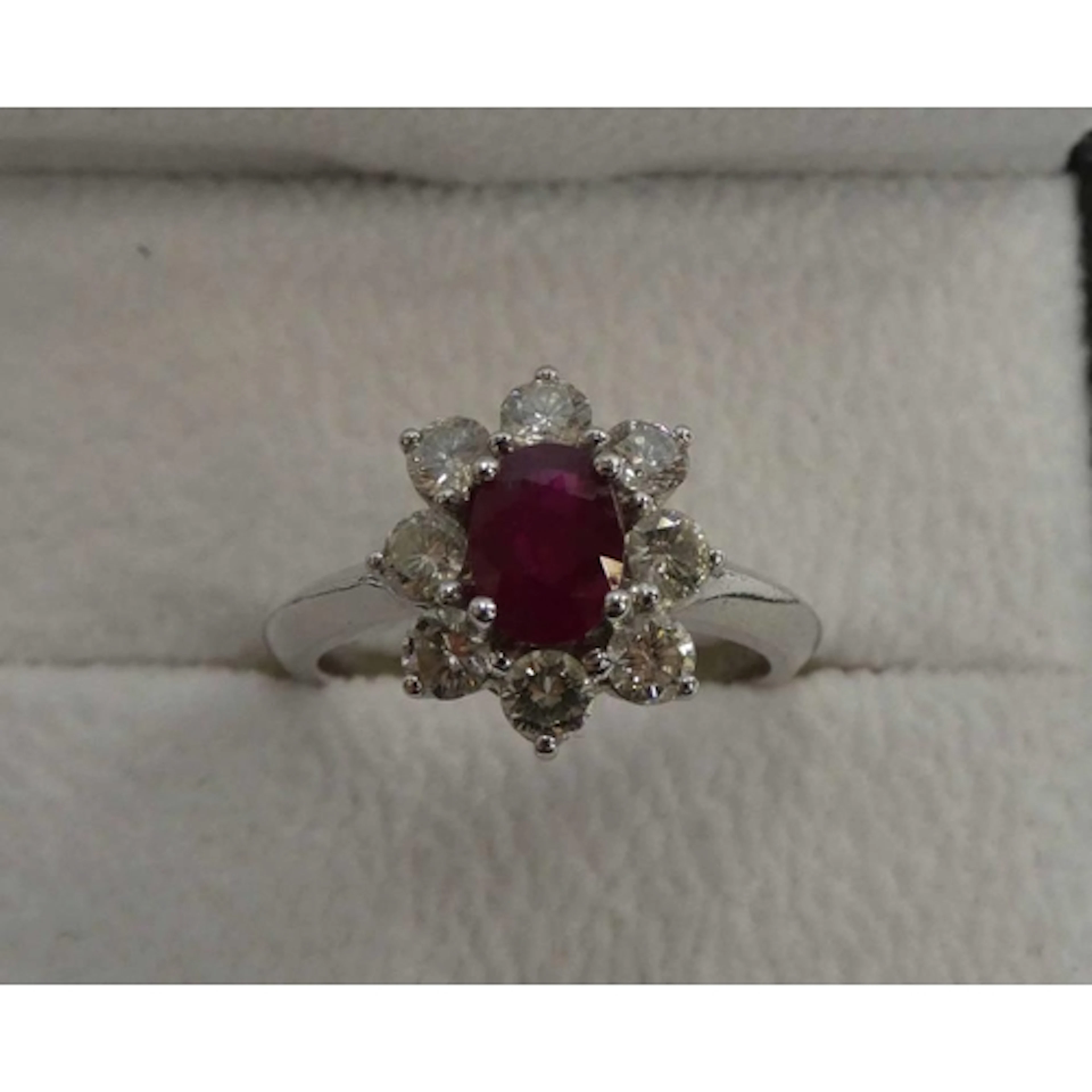 PLATINUM SET RUBY & DIAMOND CLUSTER RING, THE OVAL RUBY SET ...