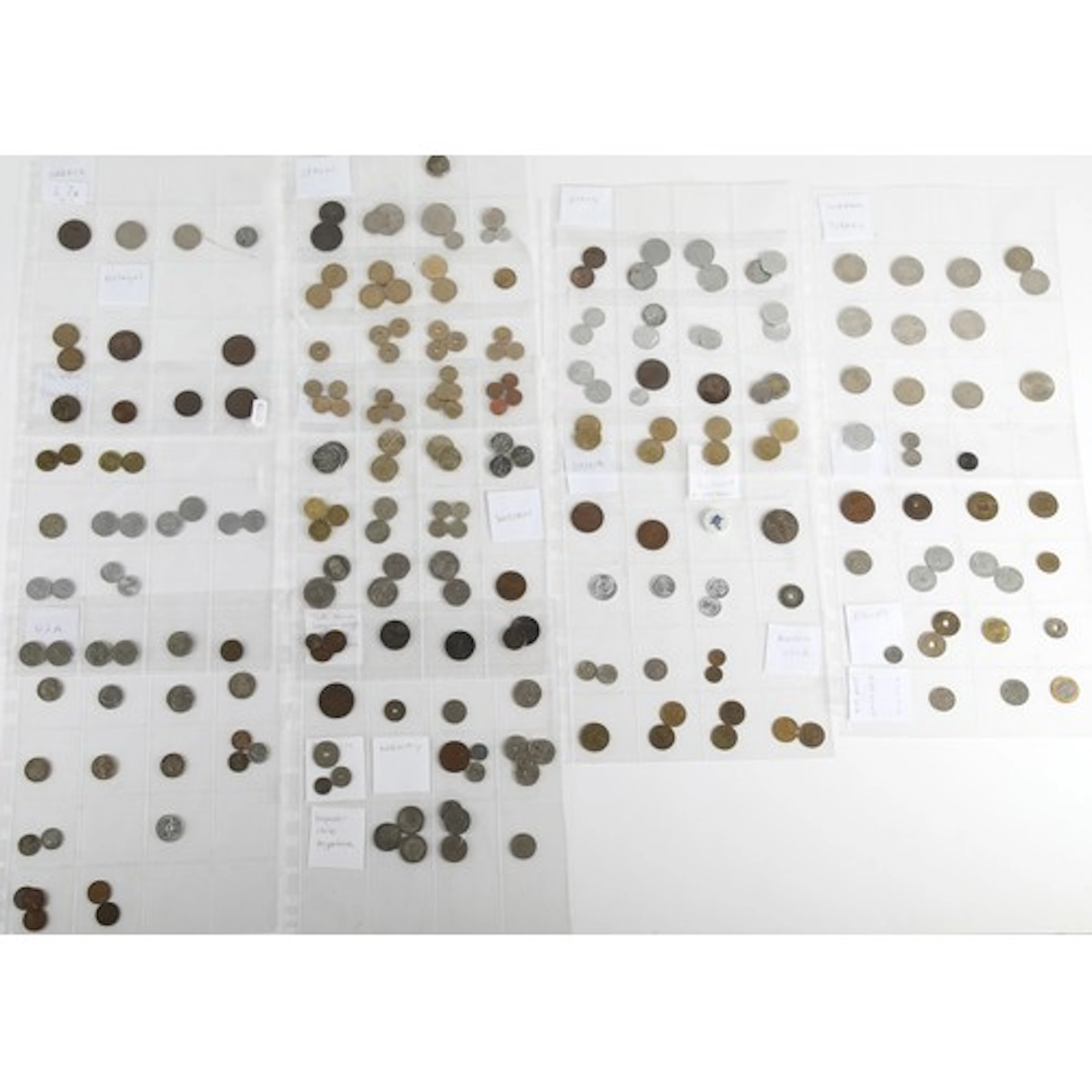 Ten sheets of coins to include Europe, Iceland, USA, Middle ...