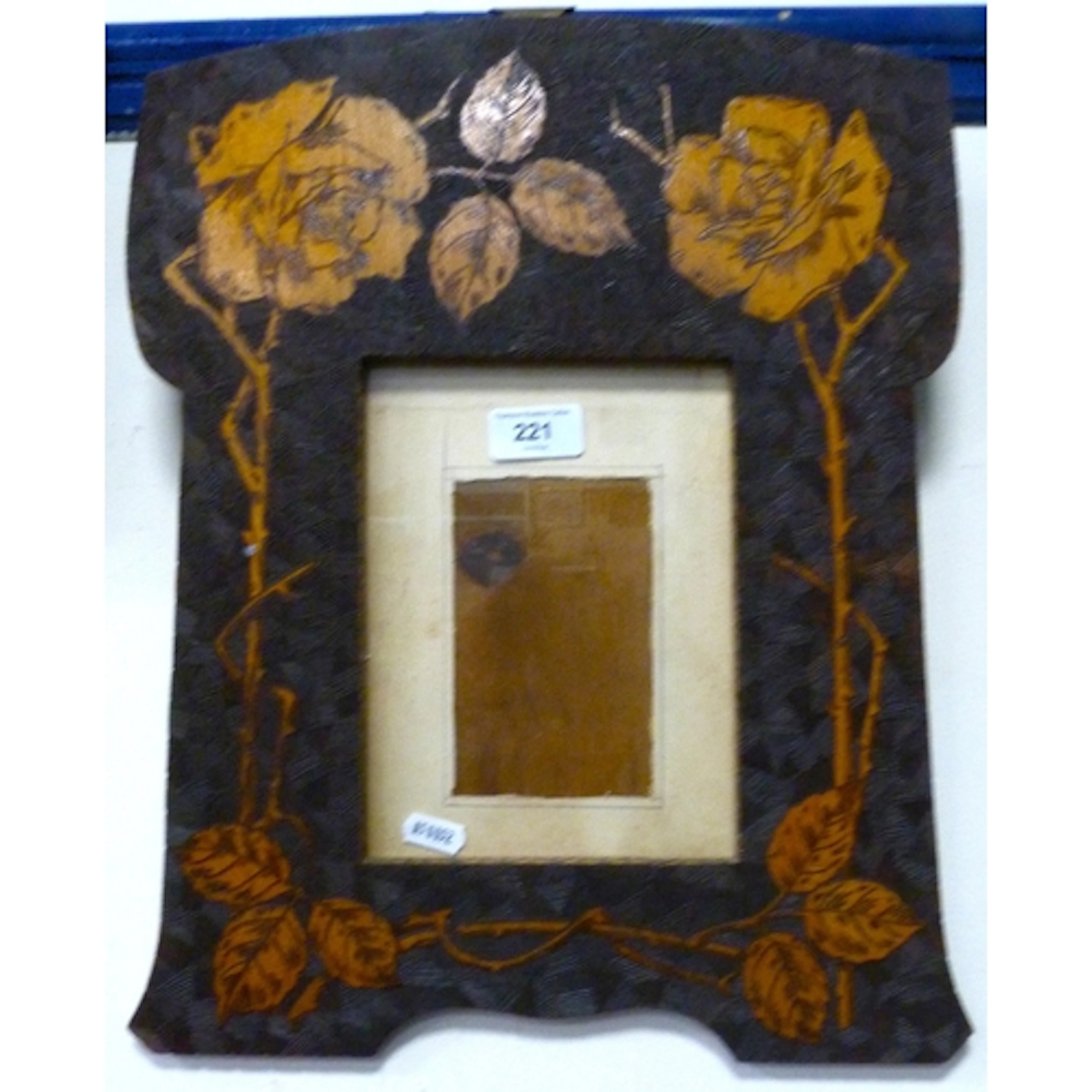 Art Nouveau pokerwork photo frame.