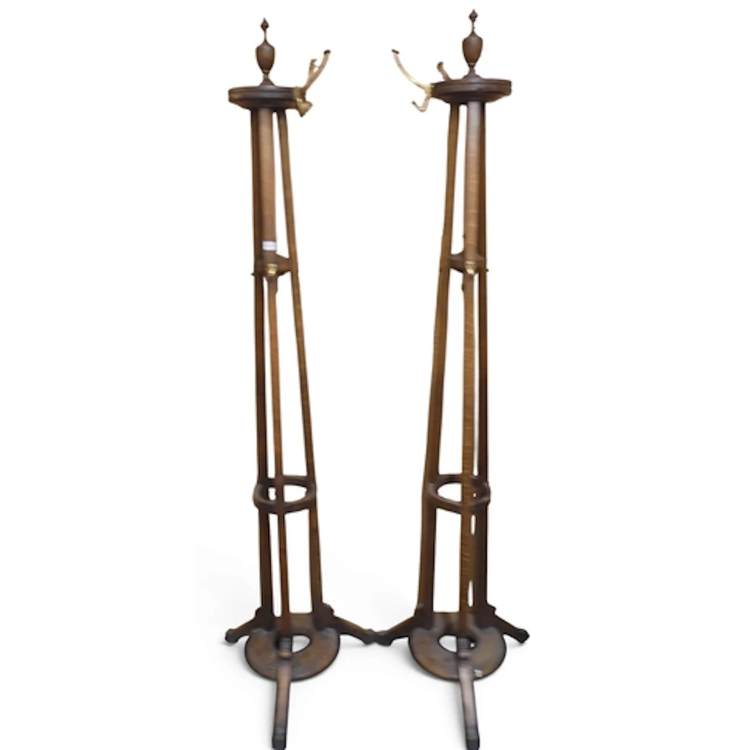 A pair of late 19th century oak hat and coat stand with bras...