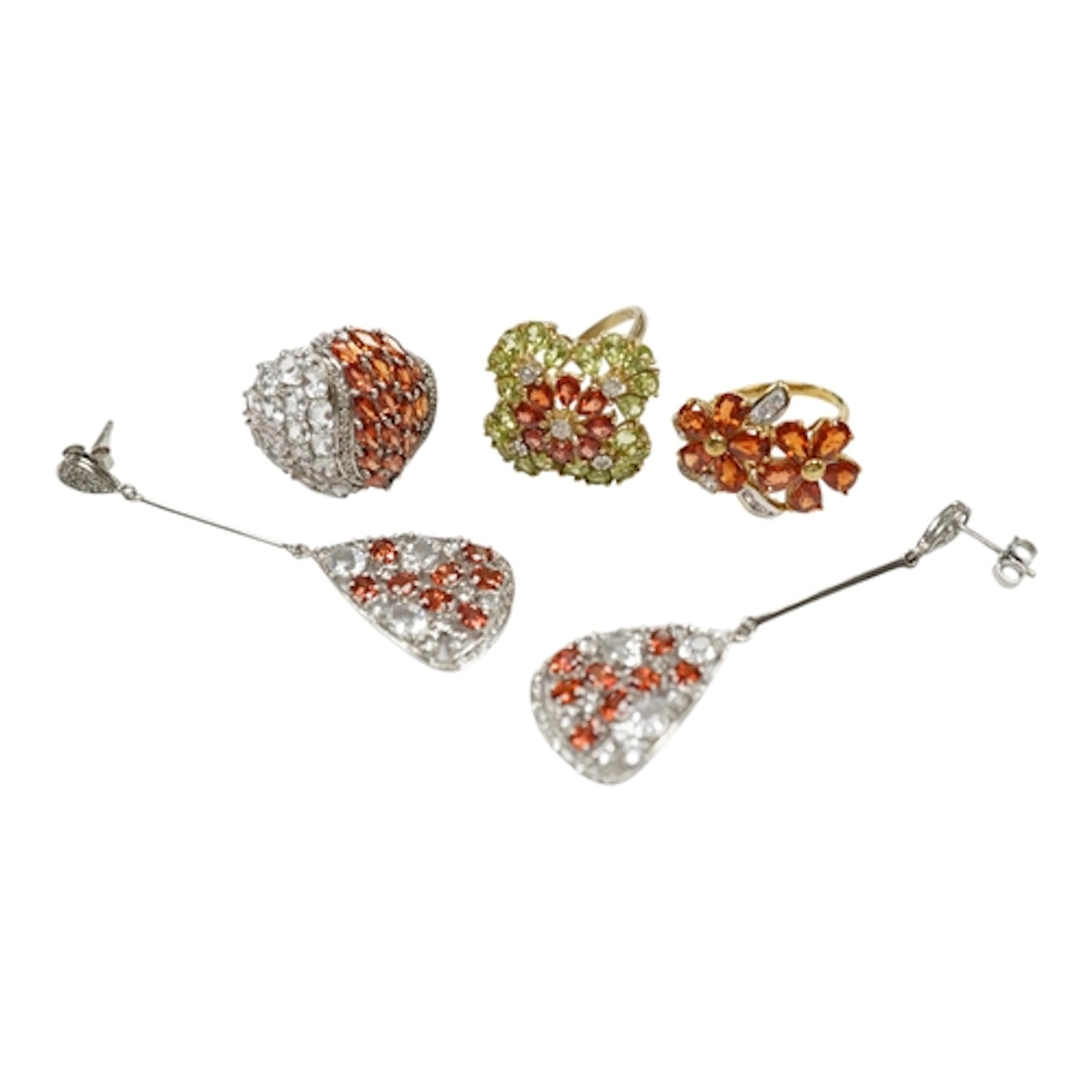 A collection of recent gem set jewels, to include a 9ct gold...