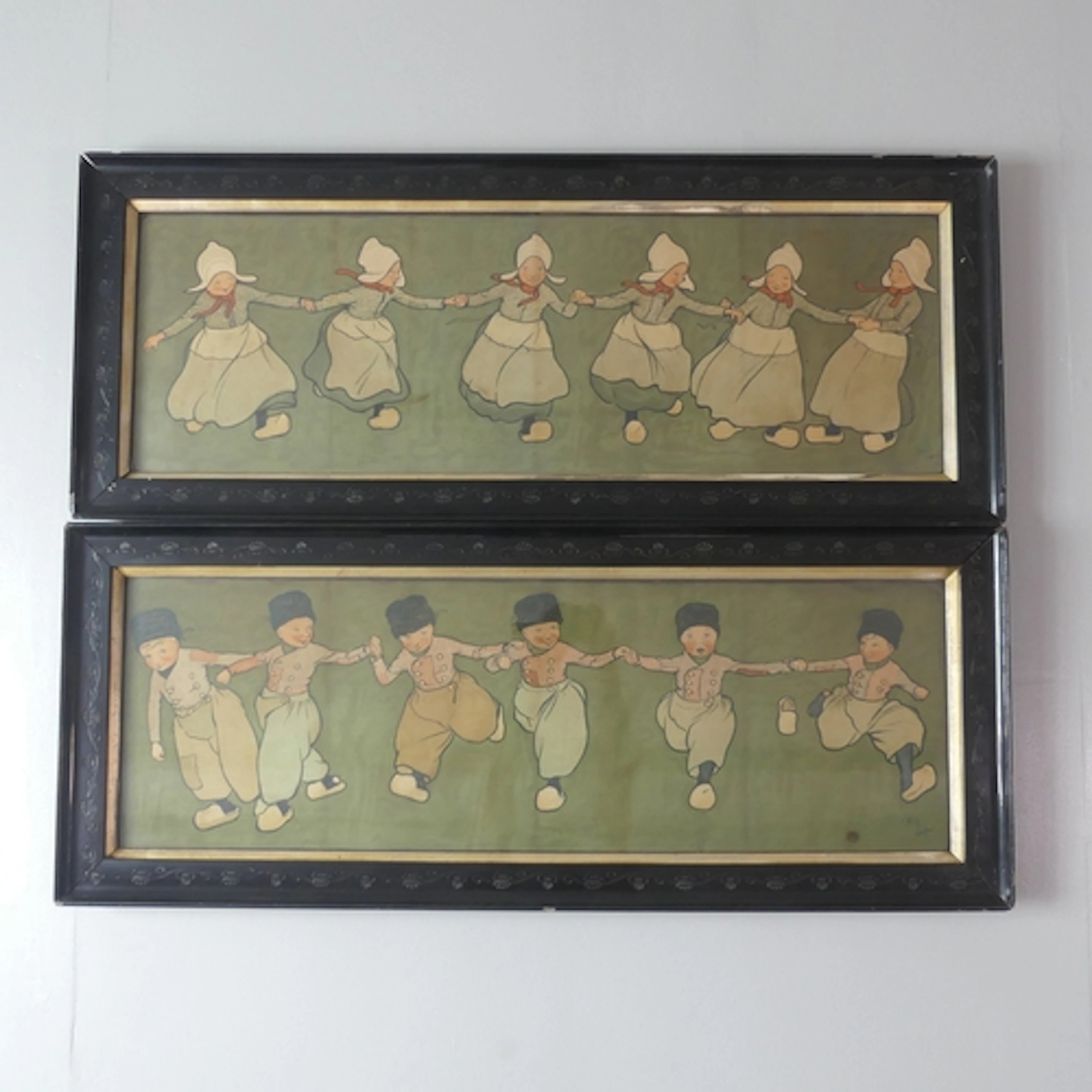 Liberty & Co - A pair of Cecil Aldin nursery prints, in ebon...