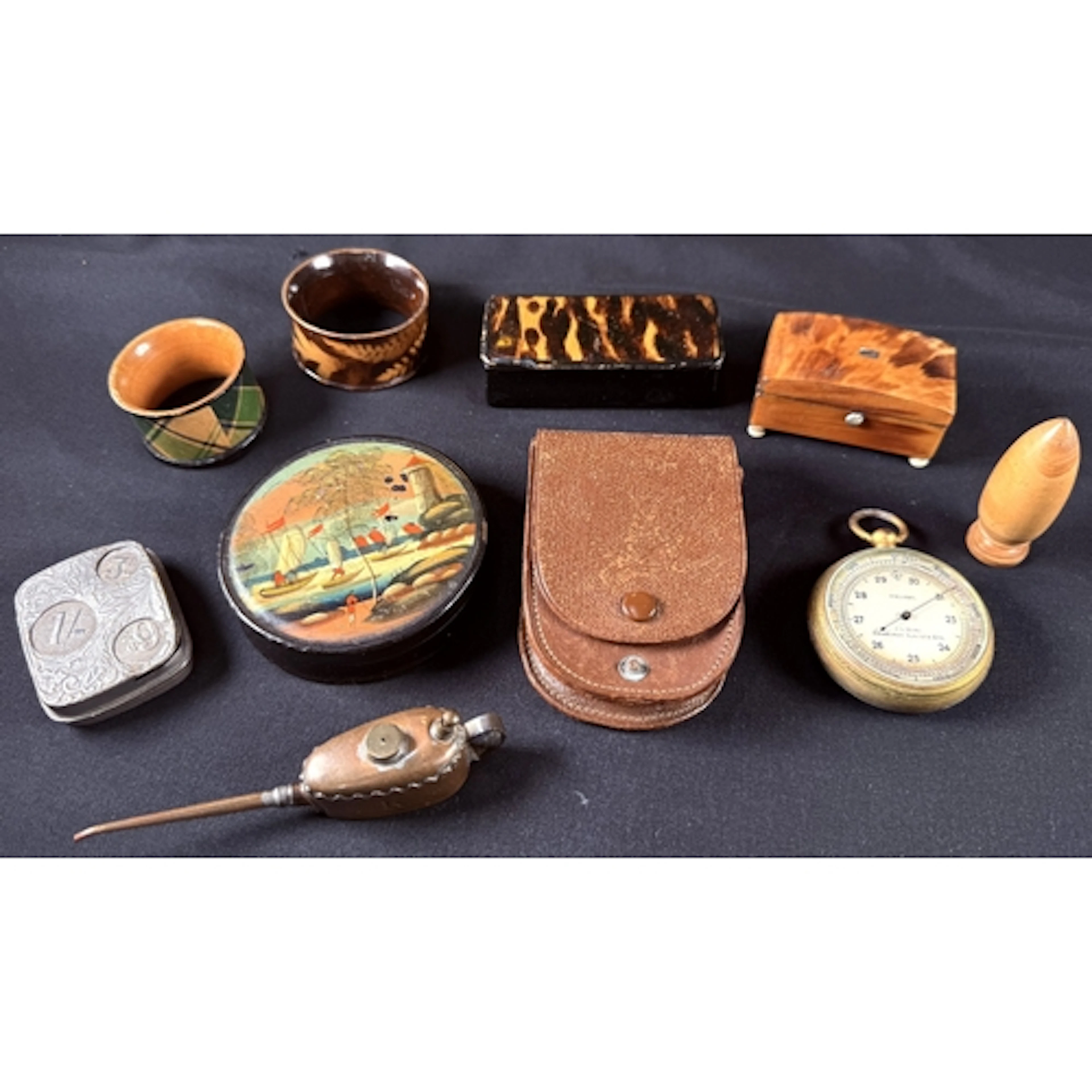 Two tortoiseshell effect snuff boxes; a lacquer box; a minia...