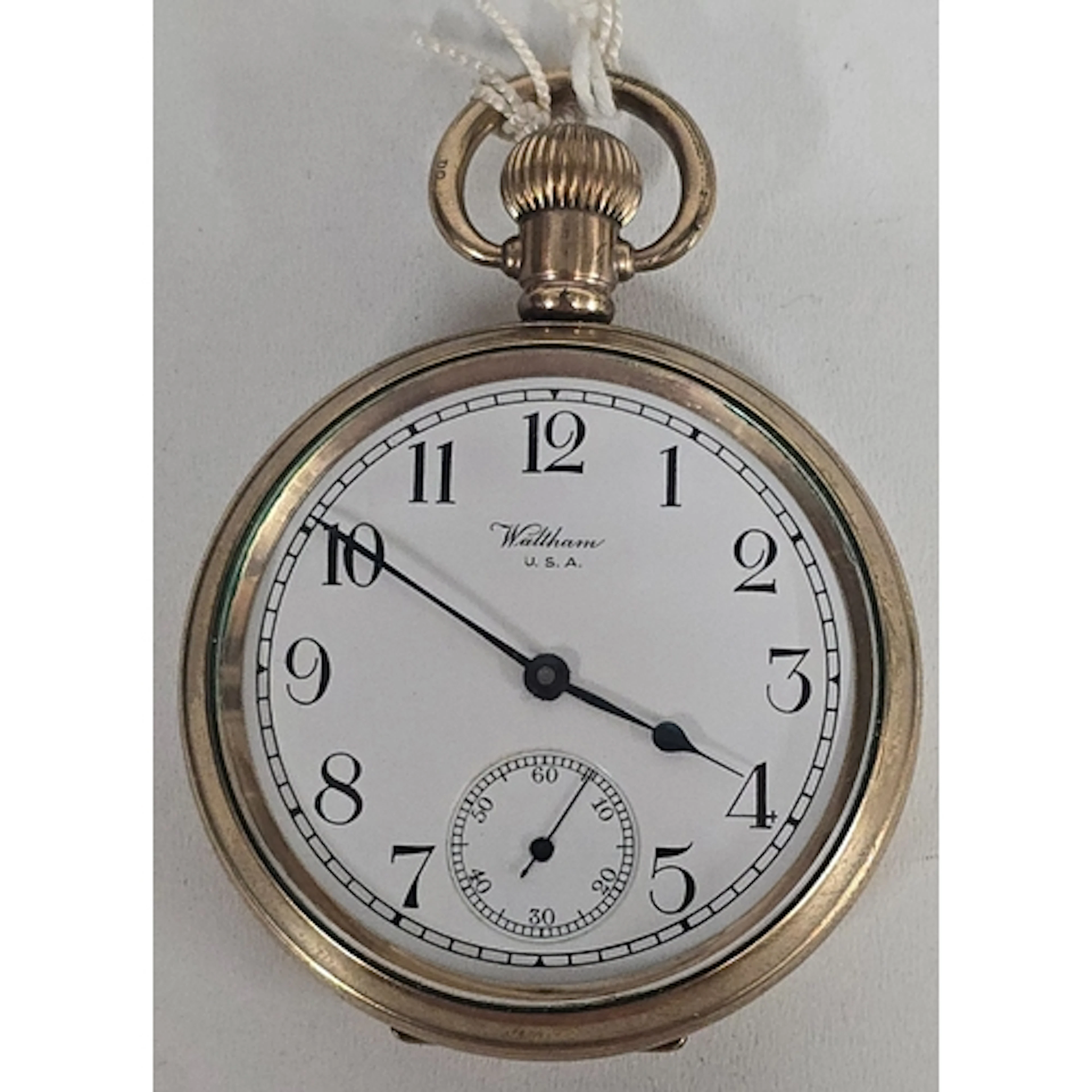 An American Waltham "Traveller" pocket watch, with "10 year"...