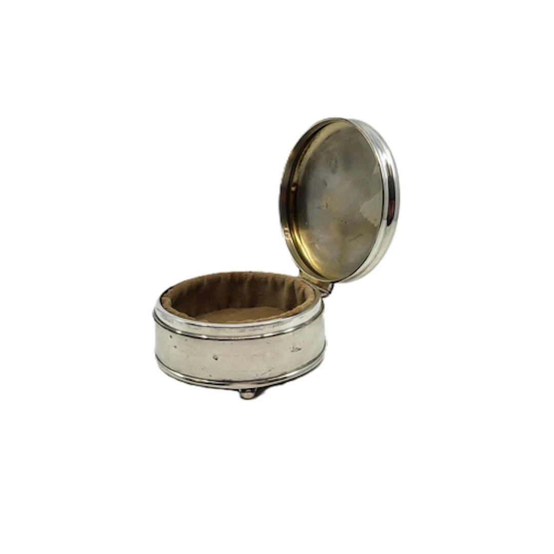 A VINTAGE STERLING SILVER JEWELLERY BOX, velvet lined with b...