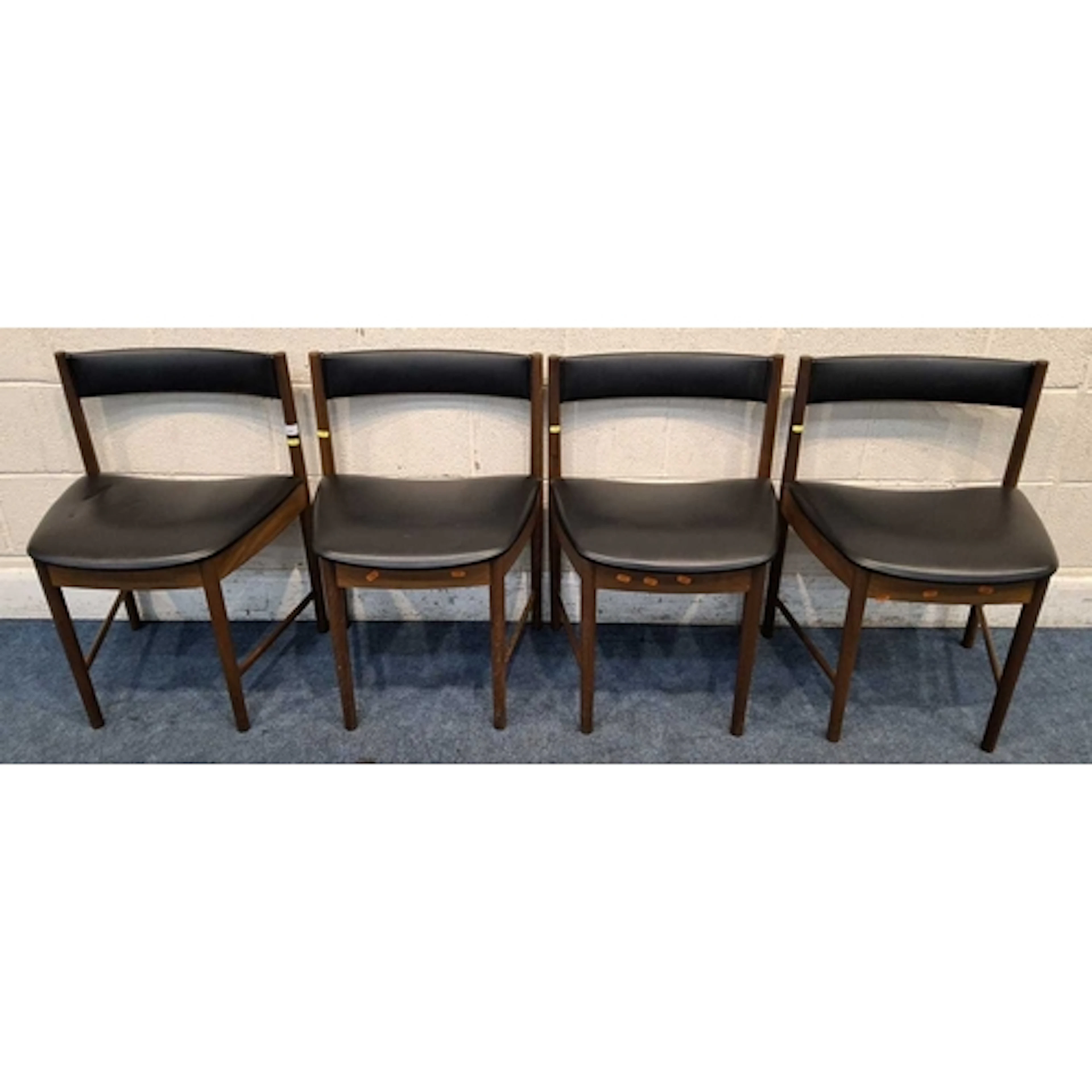 A SET OF FOUR MCINTOSH MID-CENTURY TEAK CHAIRS, with black v...