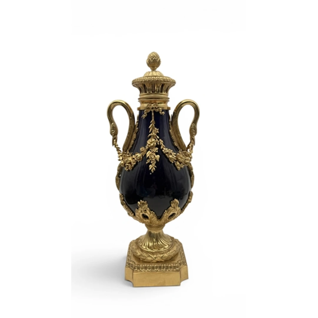 A LOUIS XV STYLE ORMOLU MOUNTED COBALT BLUE GLAZED PORCELAIN...