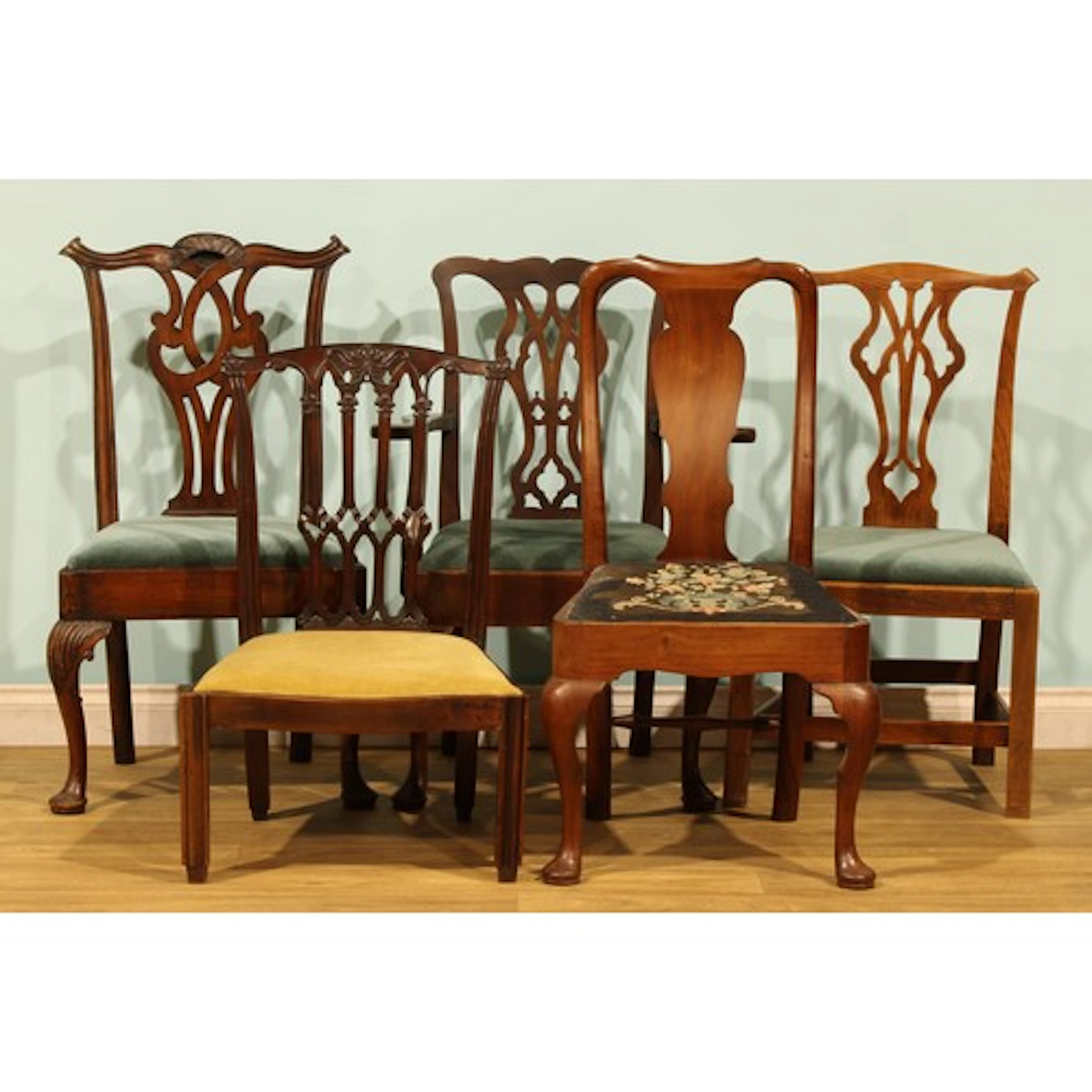 A harlequin suite of five 18th century chairs, including Chi...
