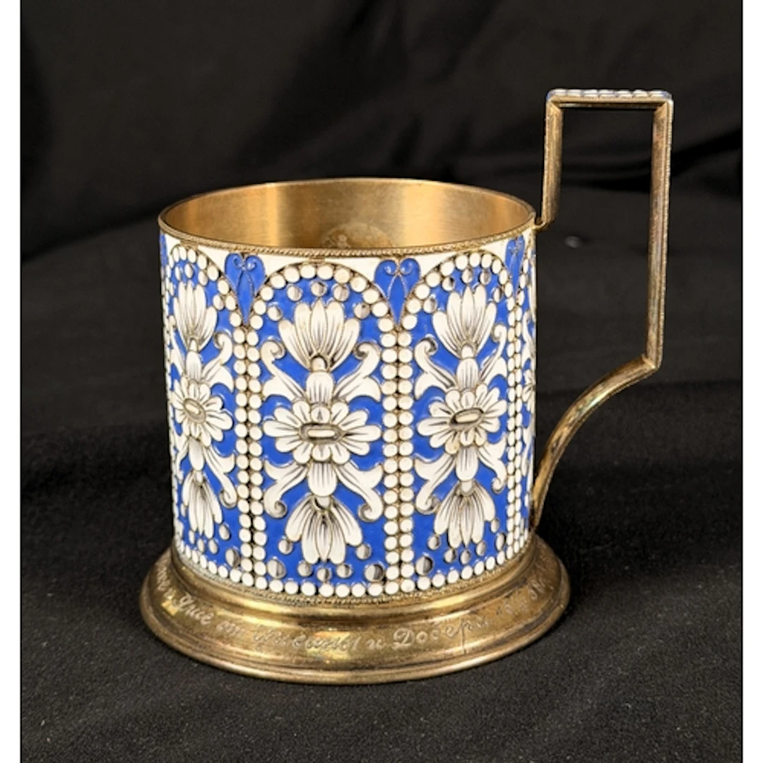 A 19th century Russian silver cup holder silver gilt and Cha...