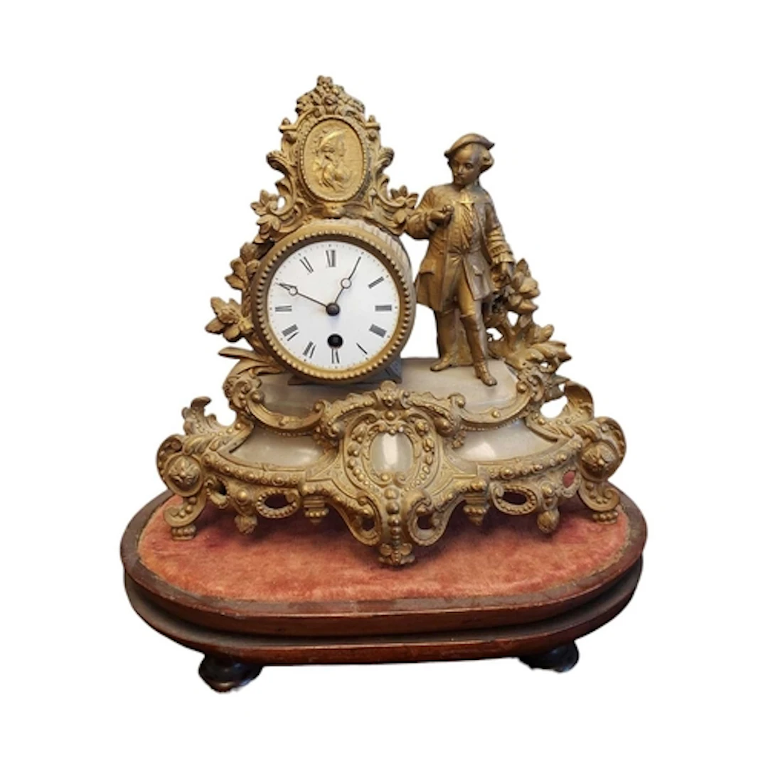 A 19th century French mantel clock. The clock having gilt sp...