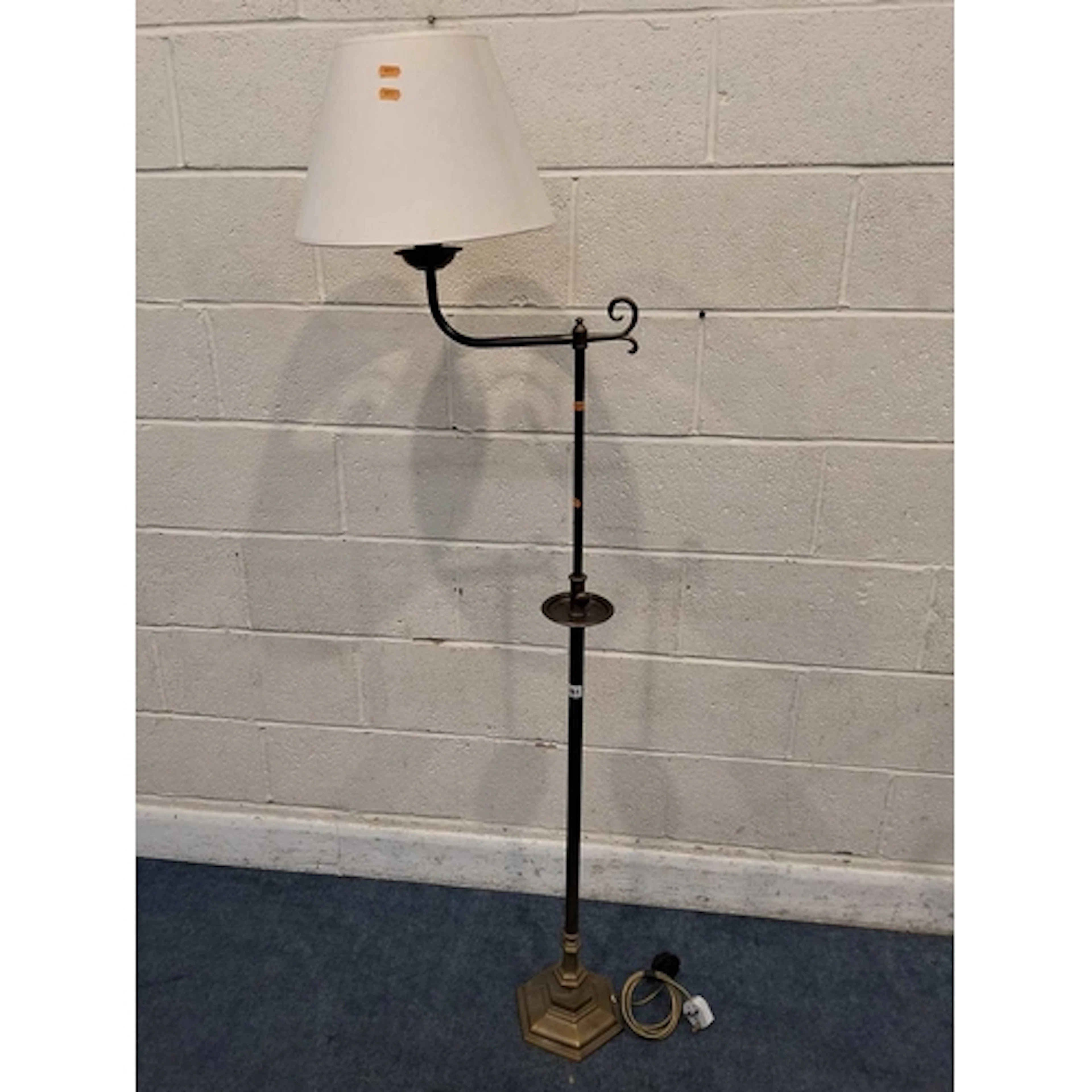 A BRASS TELESCOPIC STANDARD LAMP, with a small dish under th...