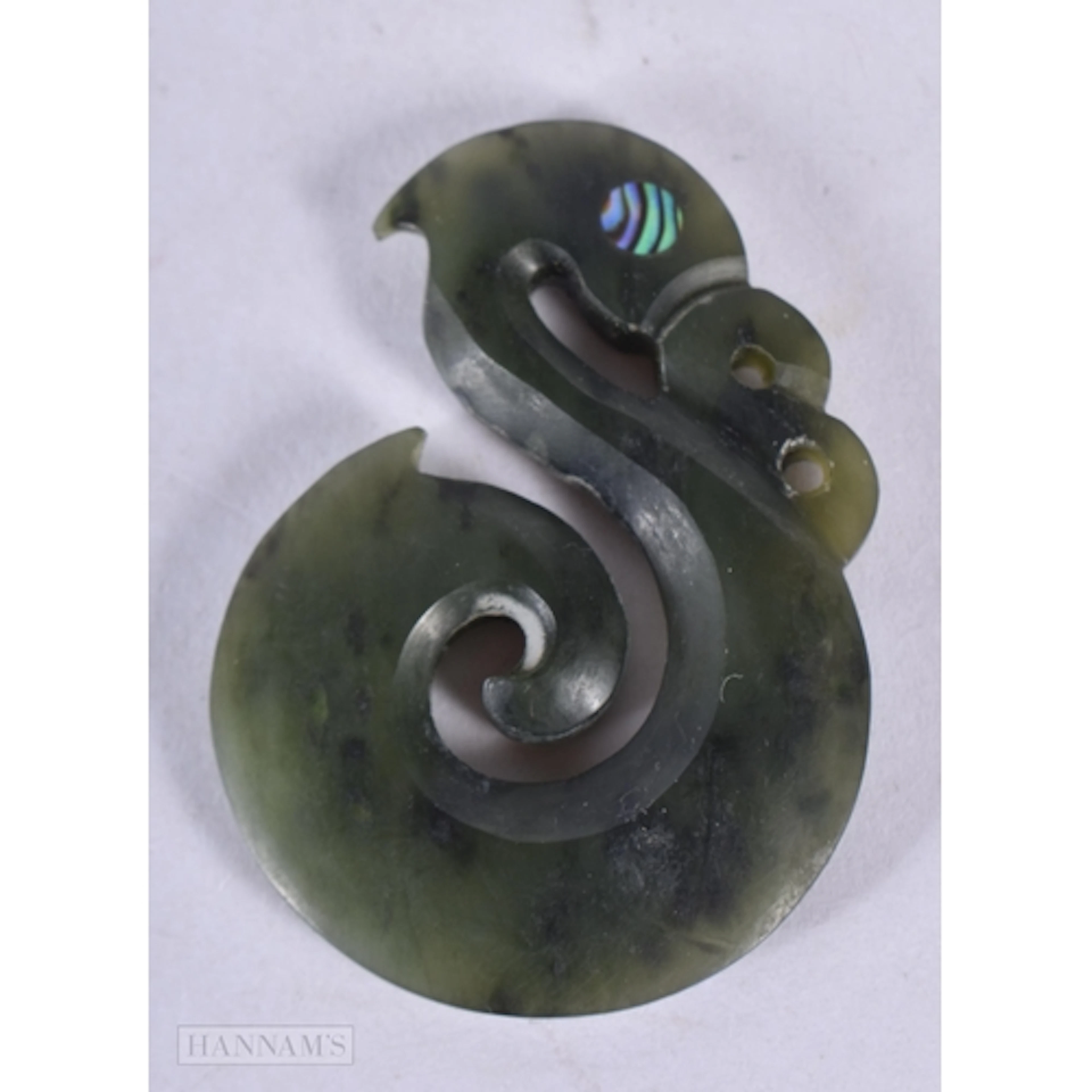 A small Maori jade pendant 5 x 3.5cm