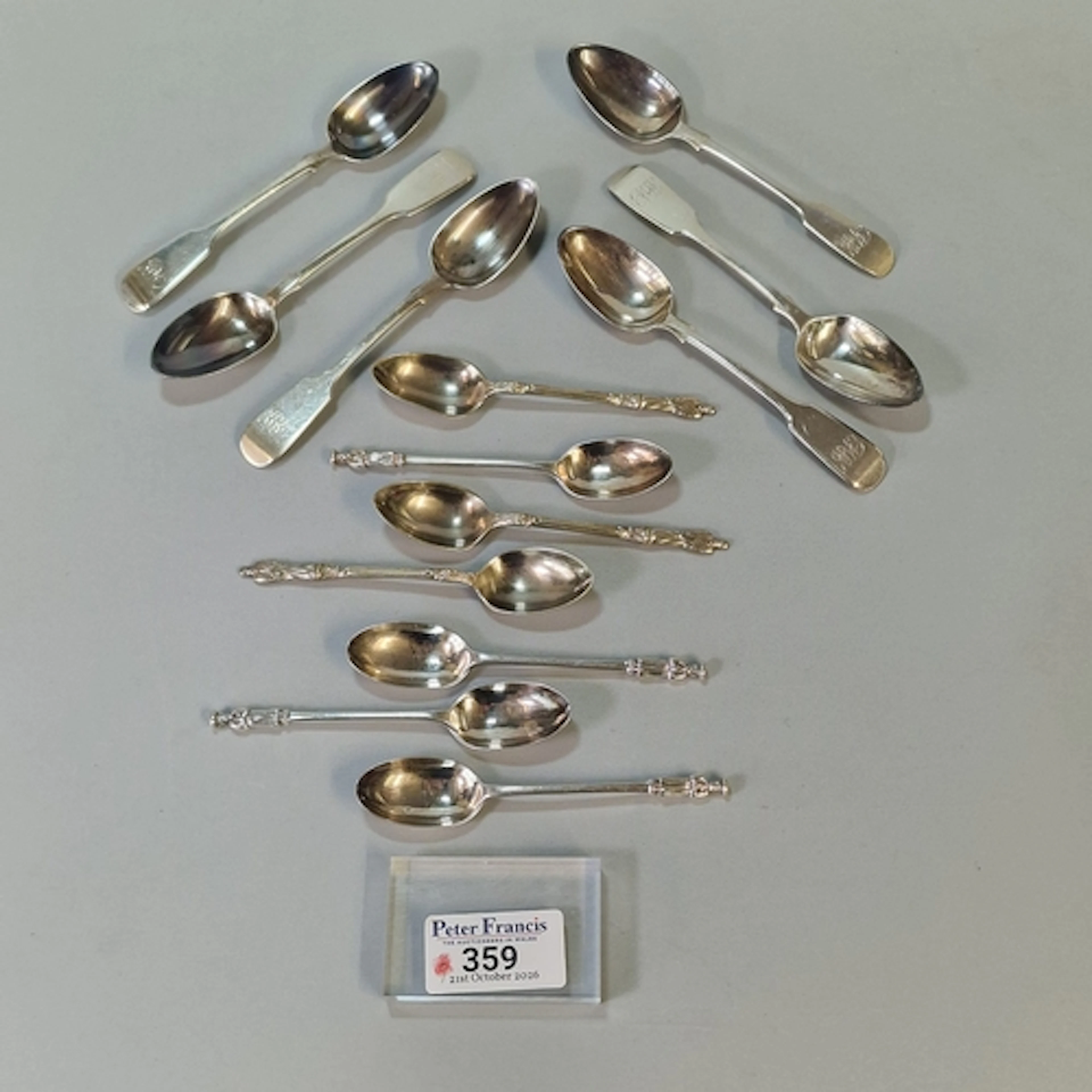 Bag of assorted silver tea spoons together with a set of fou...