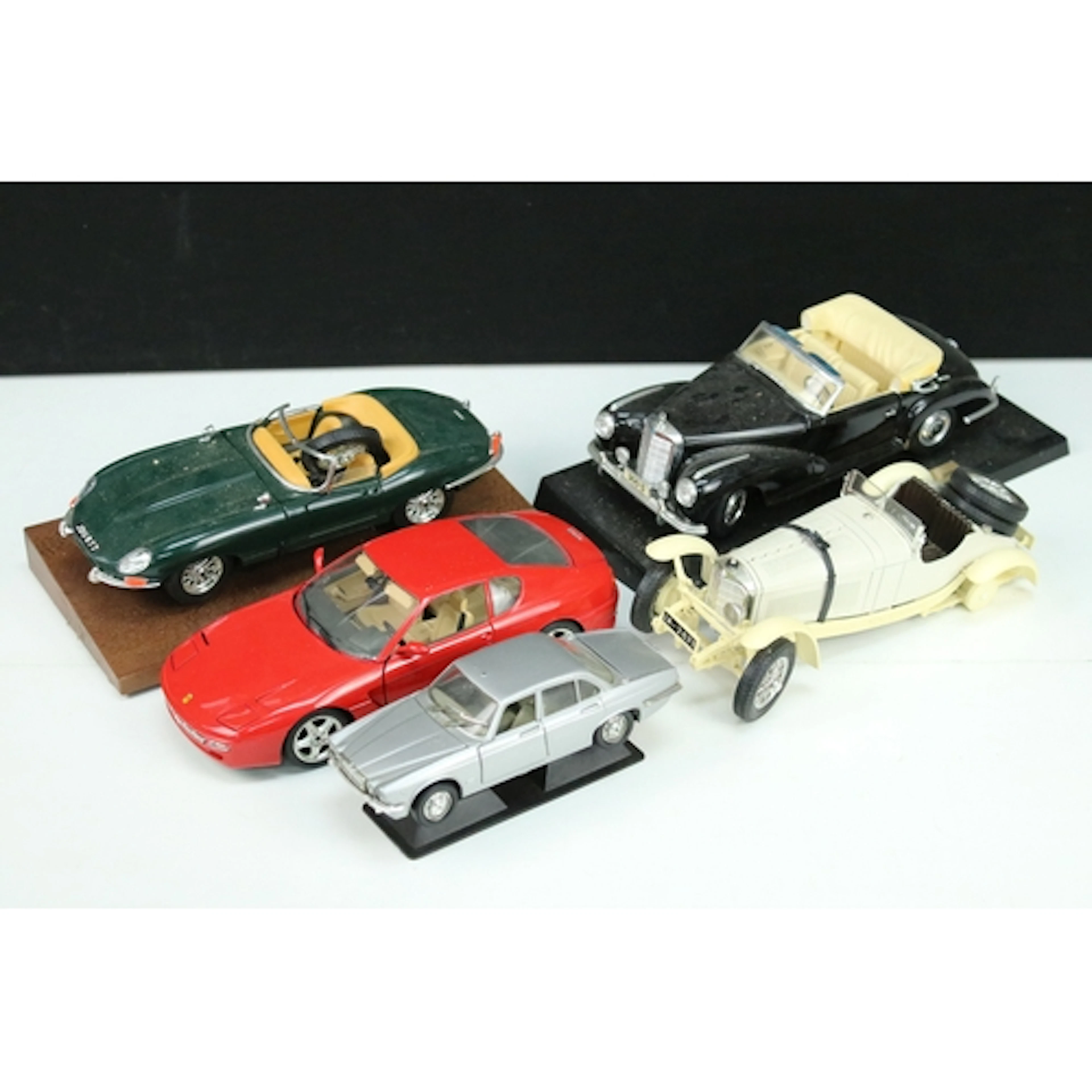 Five large scale diecast models to include Burago 1/18 Jagua...