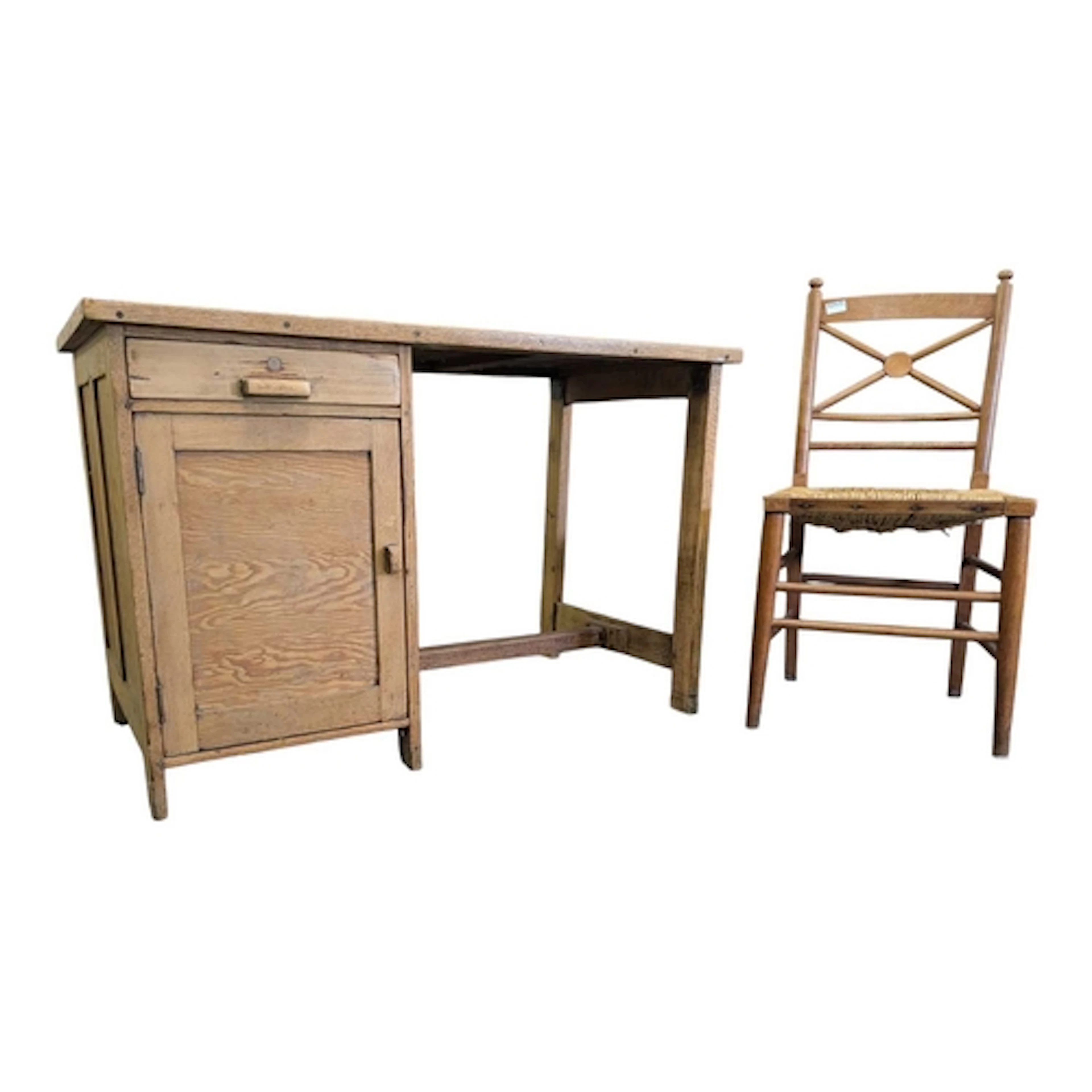 An early 20th century kneehole desk in light oak wood. The d...