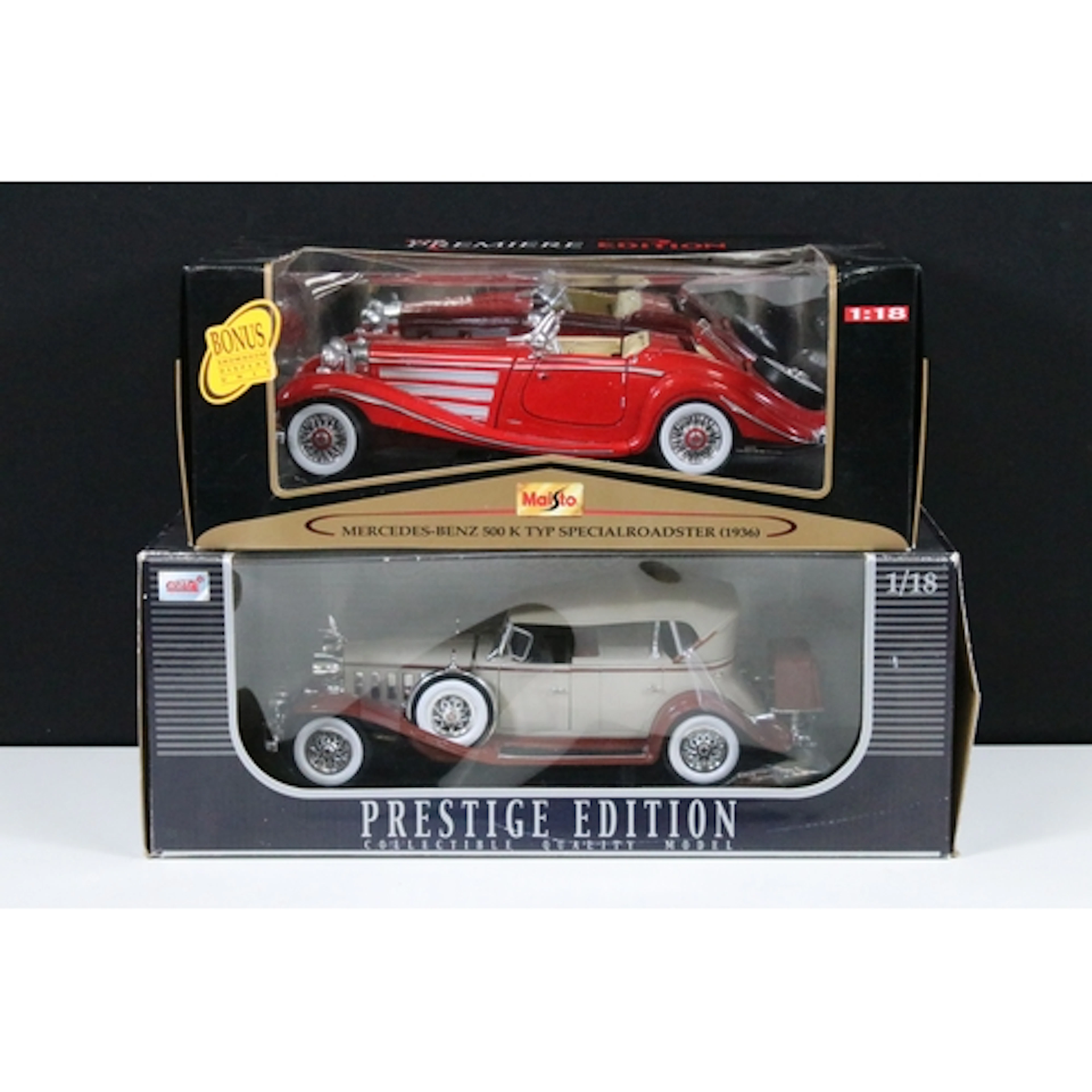 Two boxed 1/18 scale diecast models to include Maisto Premie...