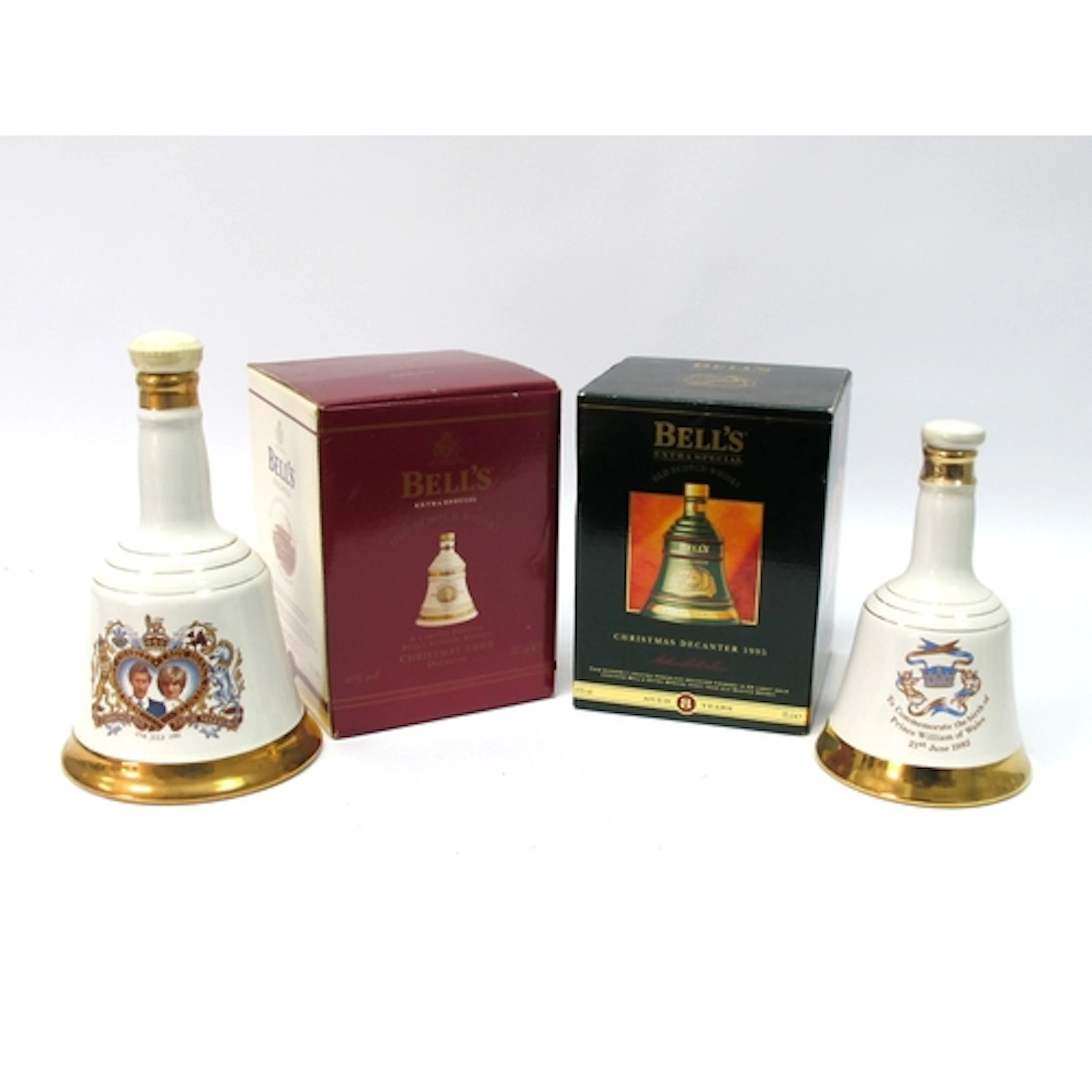 Whisky - Four Bell's Whisky Commemorative Bell Decanters, in...