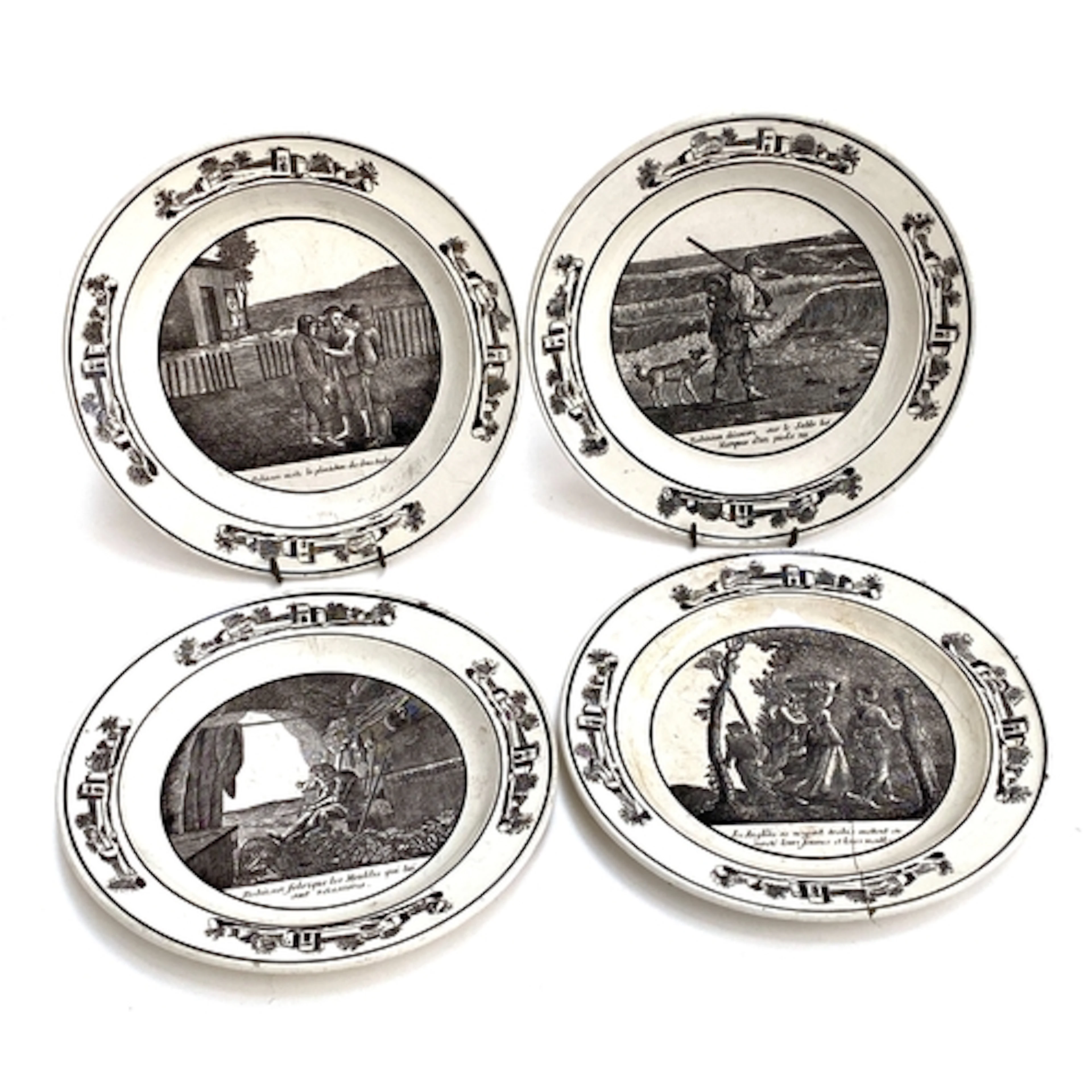 A set of four 19th century French Creil Montereau faience pl...