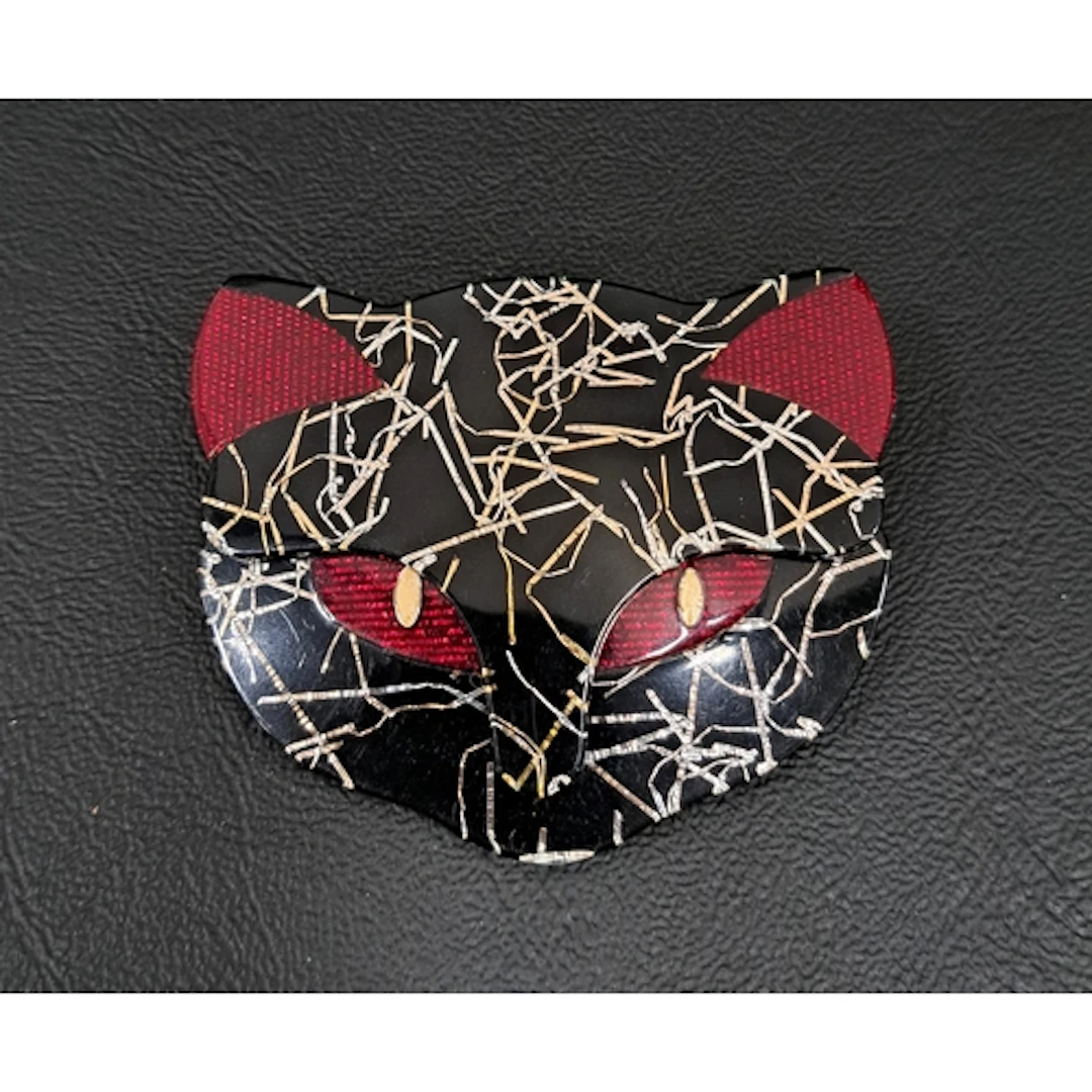 LEA STEIN ATTILA CAT HEAD BROOCH the black face with gold th...