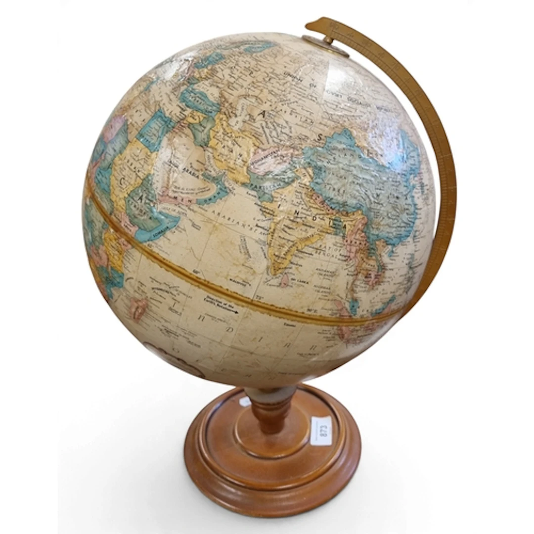 A good twelve inch in diameter Replogle World Series Globe. ...