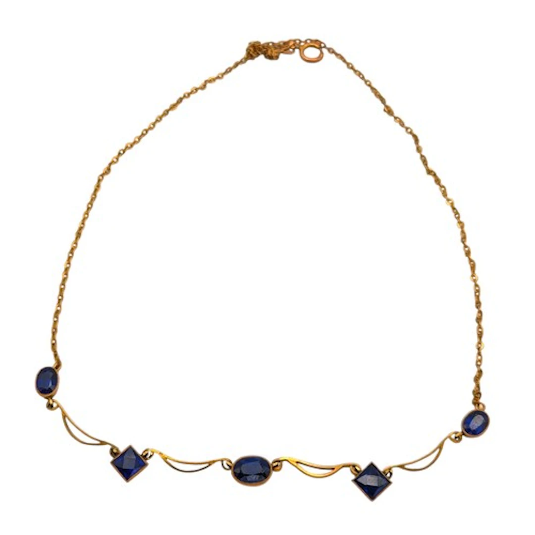 A 9ct gold and intermitted sapphire design necklace 4.2g gro...