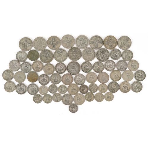 A large quantity of pre 1947 British silver coins comprising...