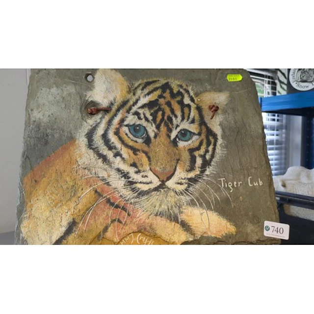 Contemporary painted stone plaque depicting a tiger cub with...