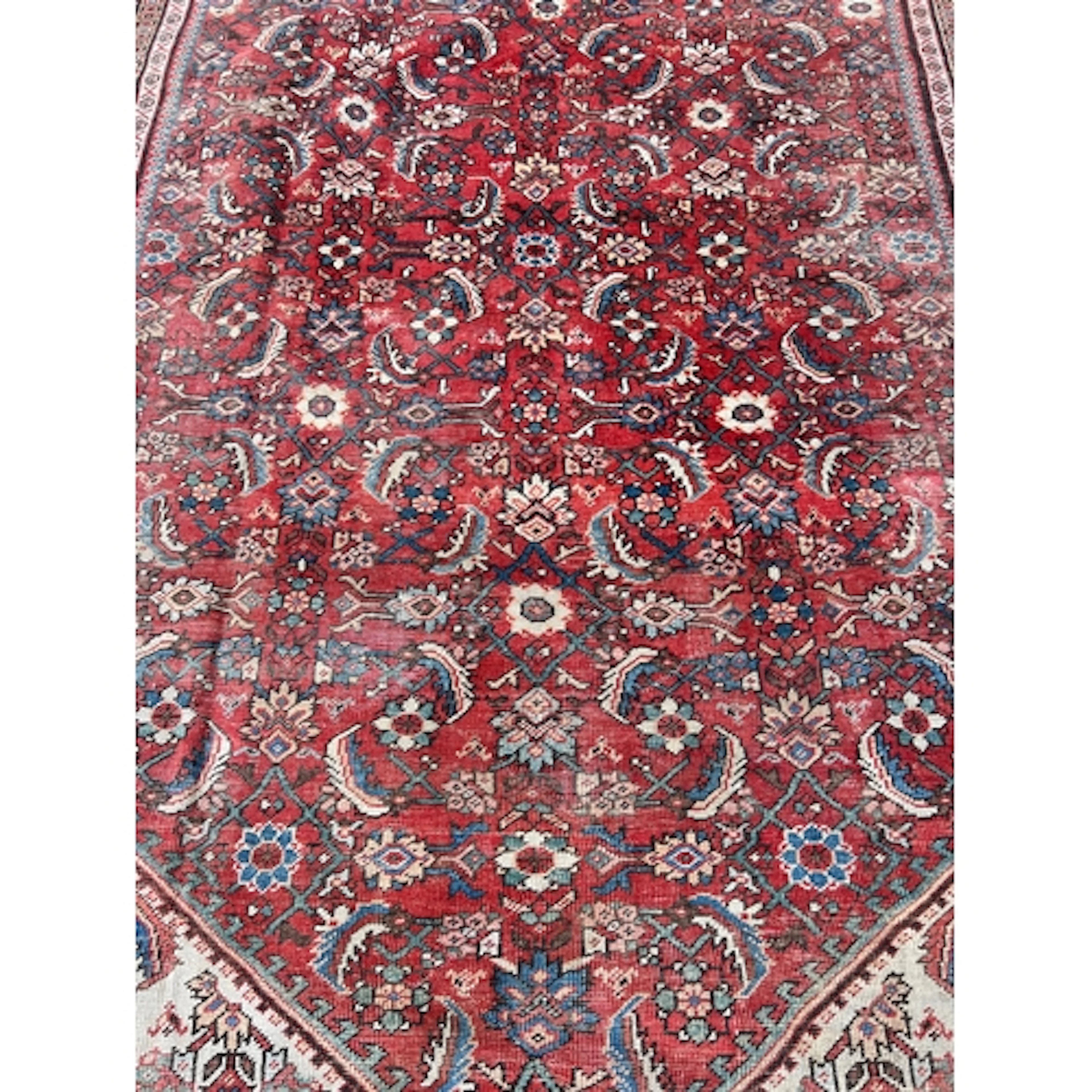 A PERSIAN MUGHAL RUG 387cm x 270cm