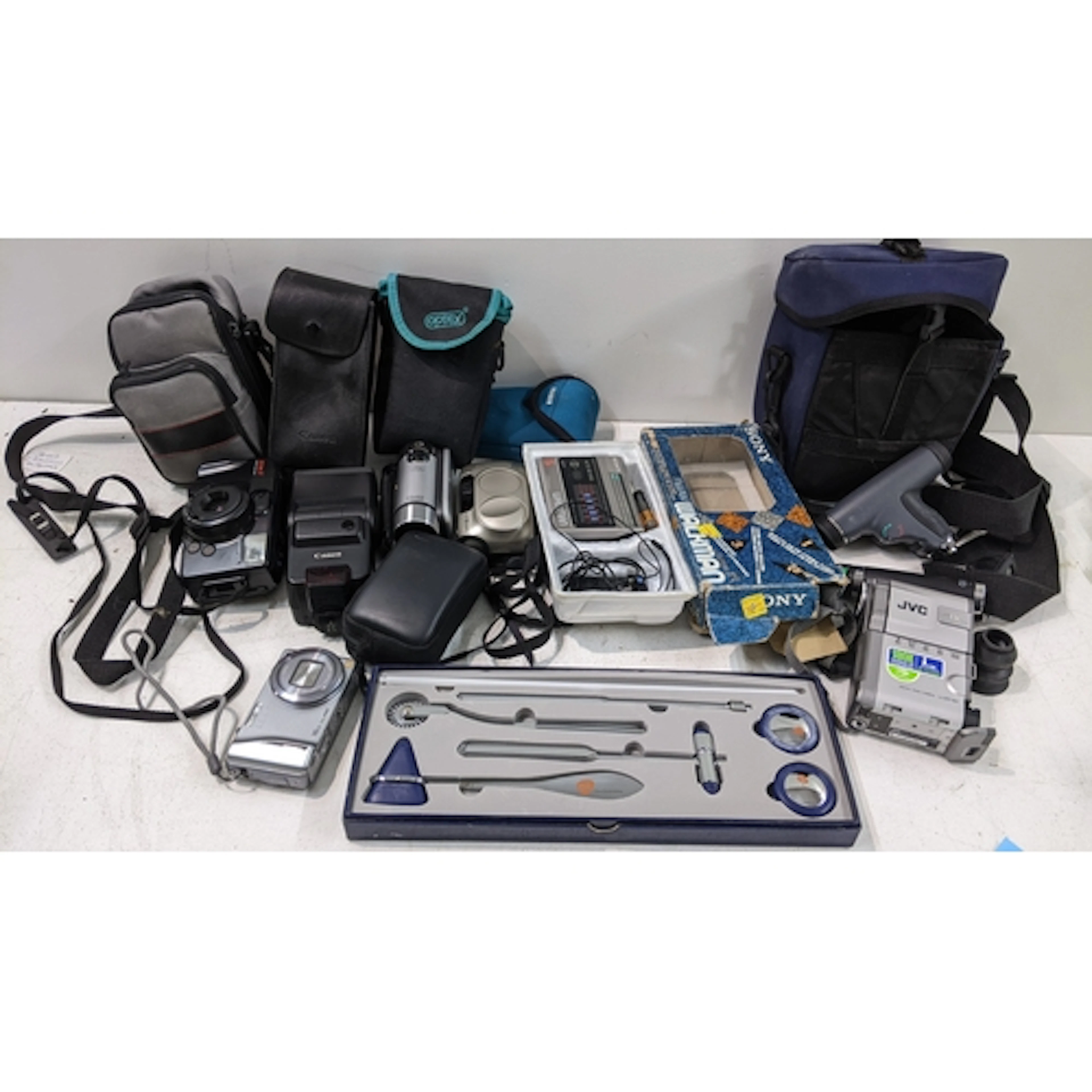 A mixed lot to include a Panasonic Lumix camera, Sony Walkma...