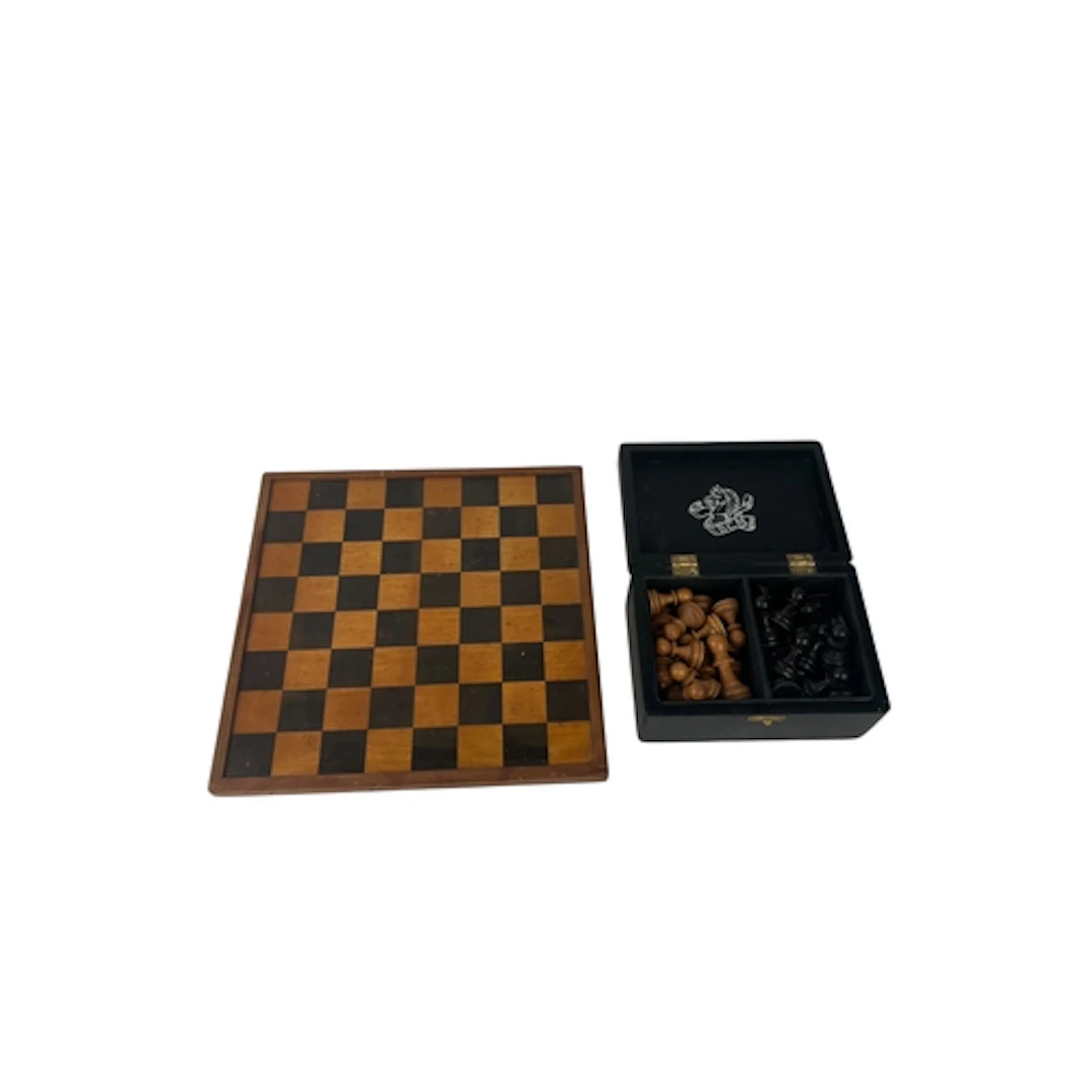 A WEIGHTED STAUNTON CHESS SET, IN A BCM BOX, TOGETHER WITH A...
