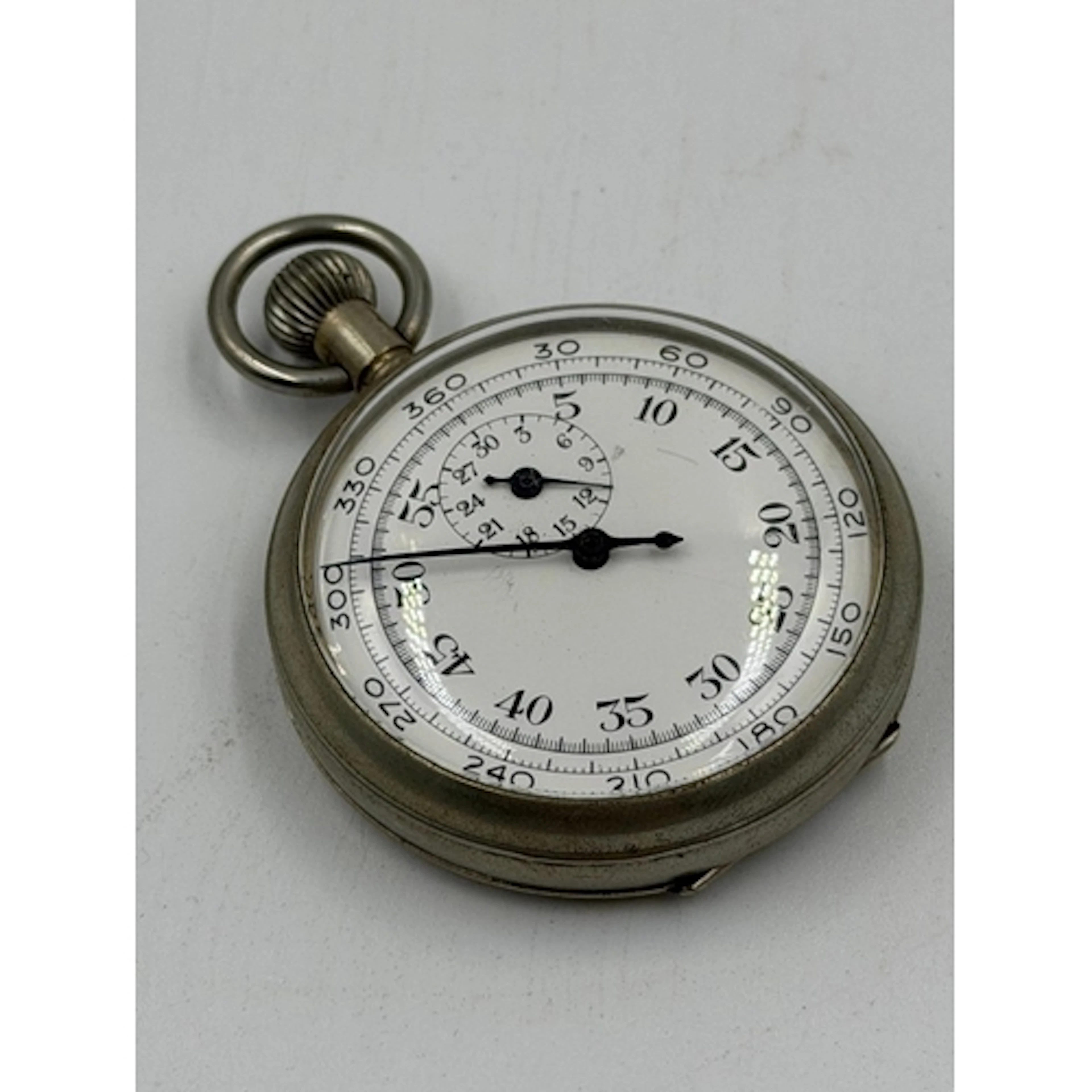 A WWII Royal Air Force Air Ministry stop watch with stores r...