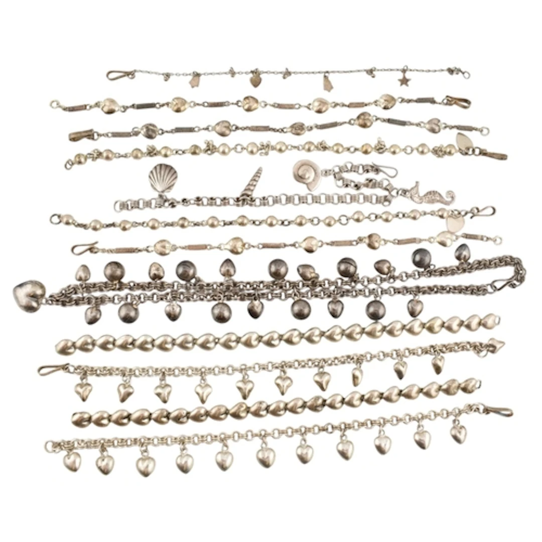 A selection of silver bracelets and necklace. Twelve items t...