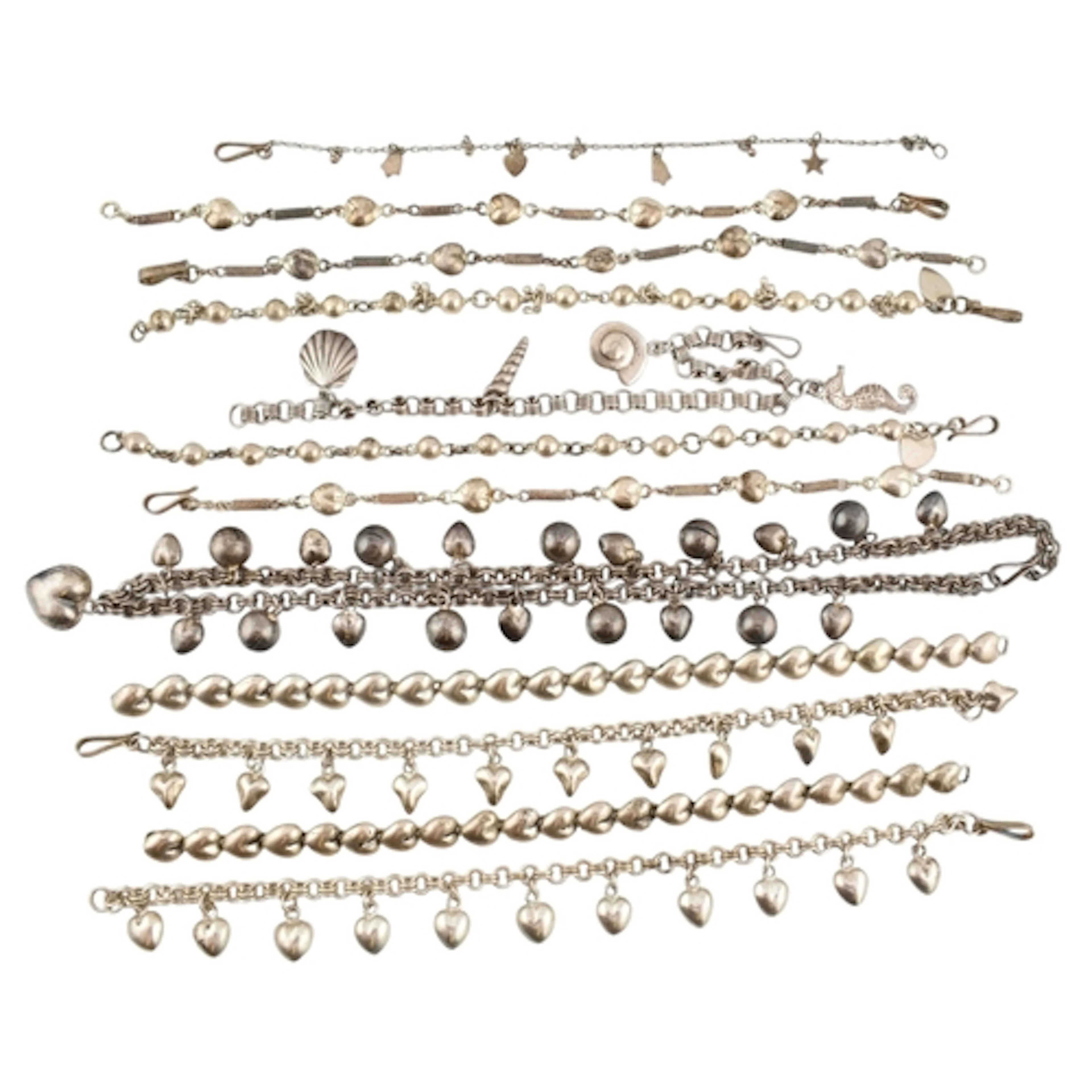 A selection of silver bracelets and necklace. Twelve items t...